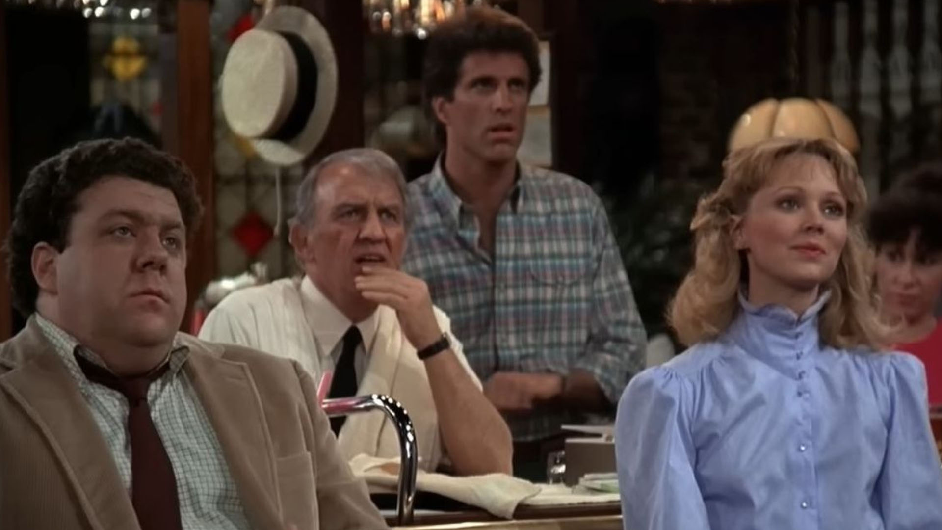 Screenshot of George Wendt, Nicholas Colasanto, Ted Danson, and Shelley Long in Cheers (1982-1993)
