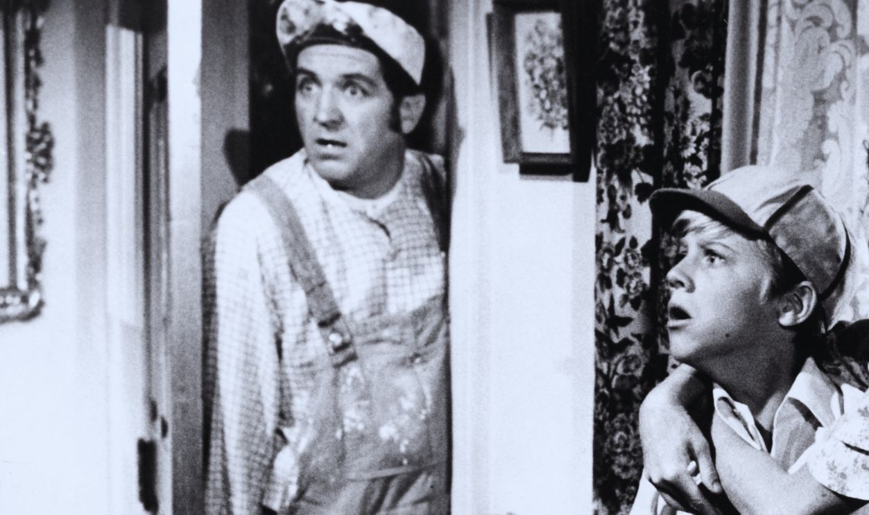 1973: (L-R) Actors George Lindsey, Vince Van Patten and Cloris Leachman look on as Fred MacMurray (not pictured) tussles with a gangster in a scene from the comedy-fantasy movie "Charley And The Angel" which was released in 1973.