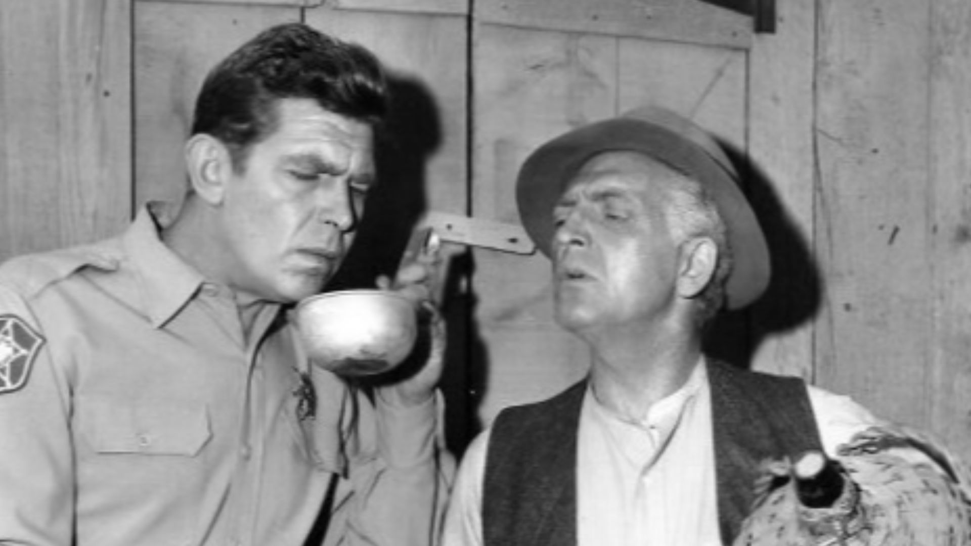 Photo of Andy Griffith and Everett Sloane from the television program The Andy Griffith Show.  In this episode, Andy investigates a barn fire and finds a still.