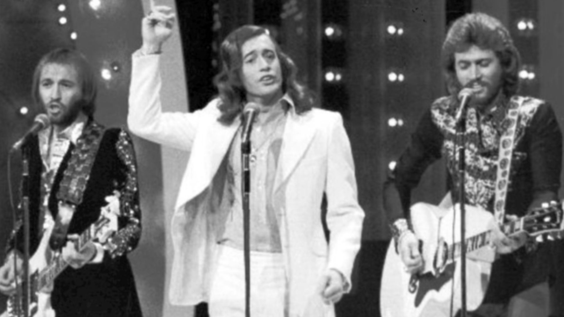 Photo of the Bee Gees performing on the television program The Midnight Special.