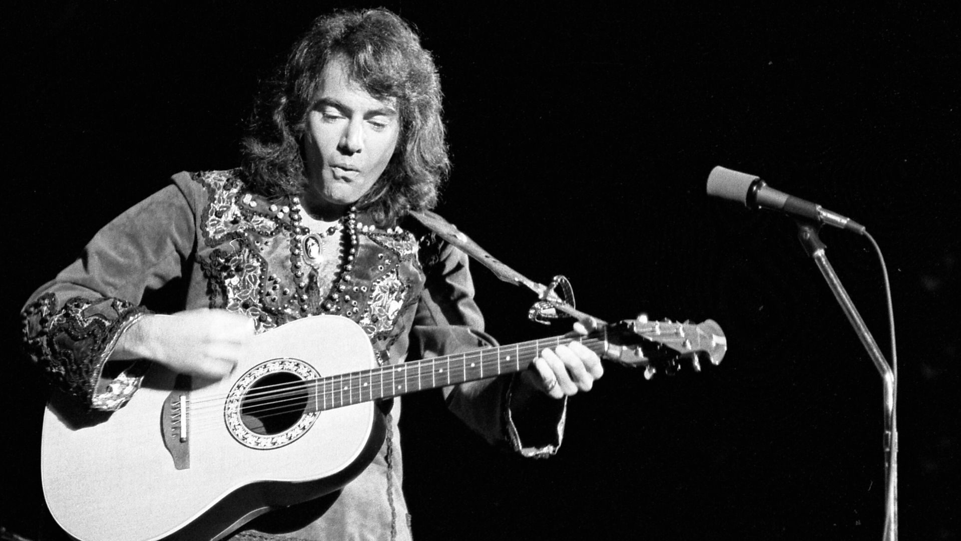 Neil Diamond on stage at the Greek Theater in Los Angeles