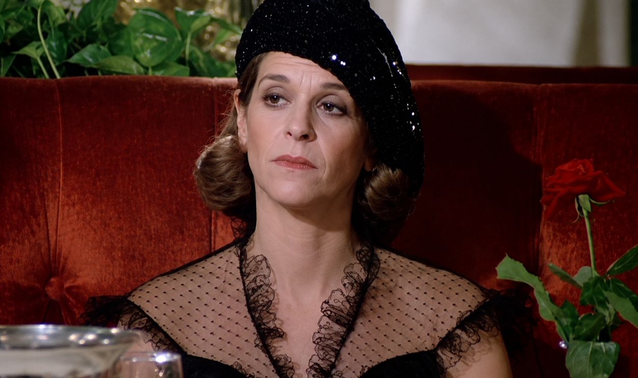 Screenshot from The Woman in Red (1984) 