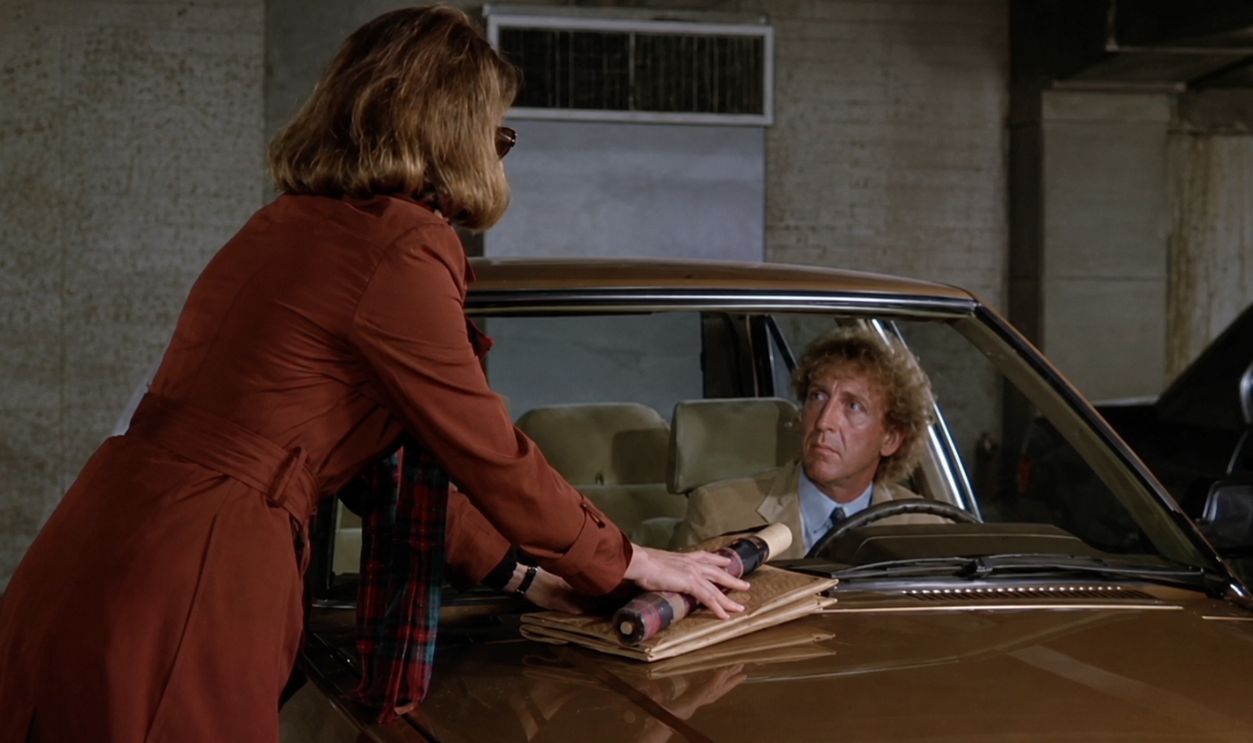 Screenshot from The Woman in Red (1984) 