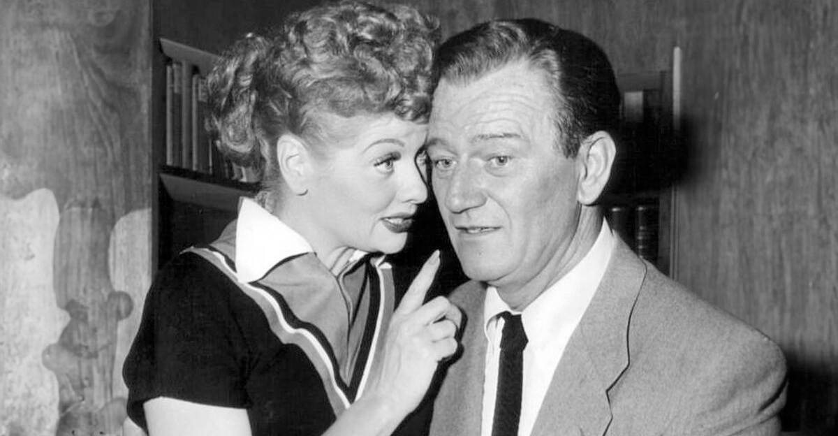 Publicity photo of John Wayne and Lucille Ball from the television program I Love Lucy.