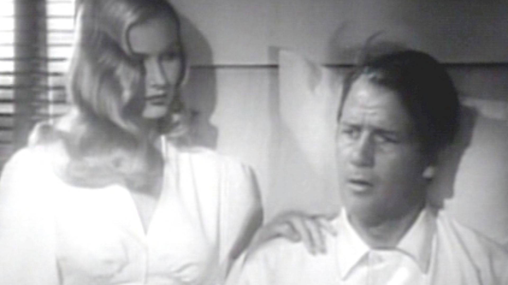 Cropped screenshot of Veronica Lake and Joel McCrea from Sullivan's Travels.