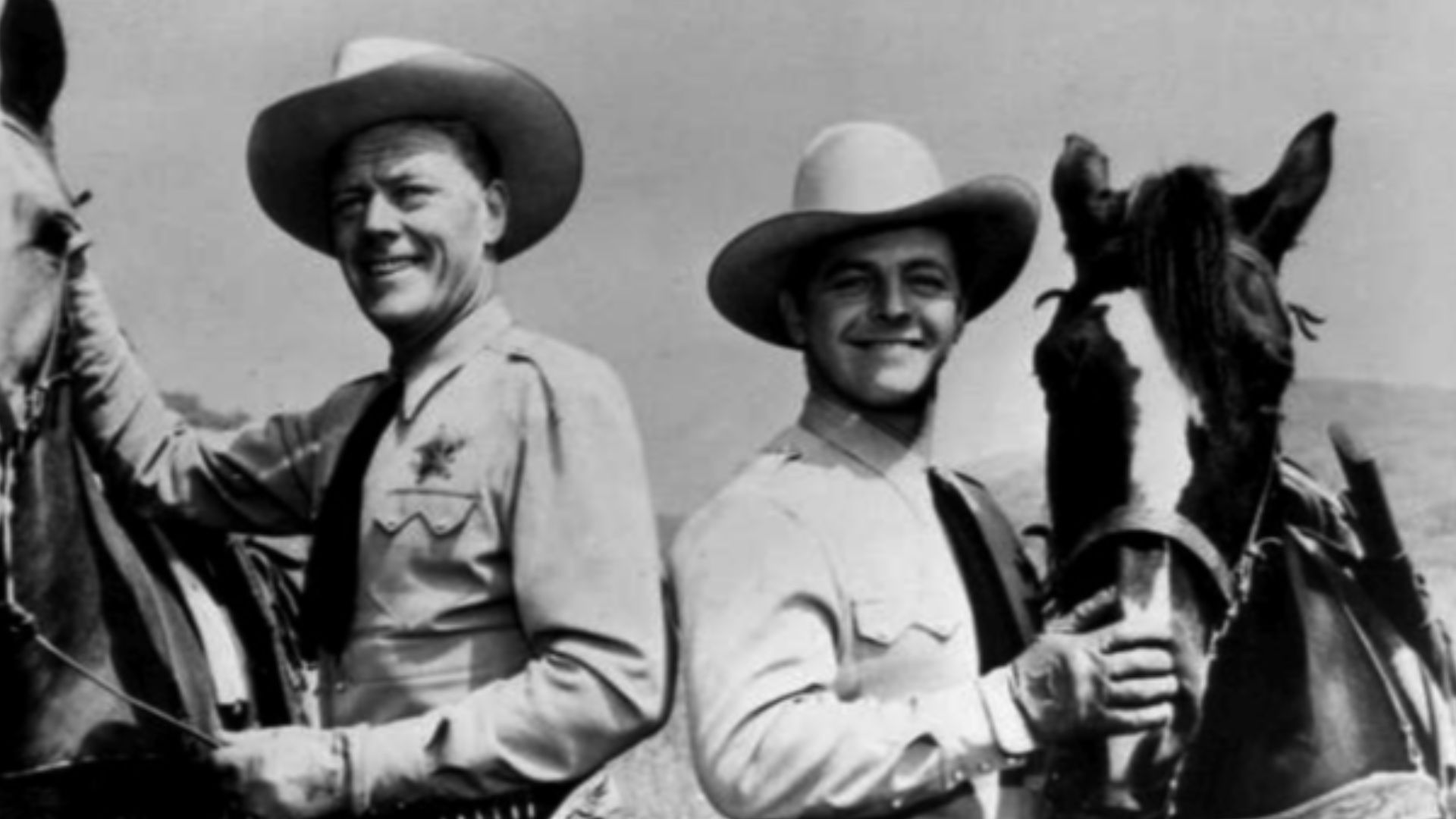 Photo of Willard Parker (left) as Jace Pearson and Harry Lauter as Clay Morgan from the television program Tales of the Texas Rangers.