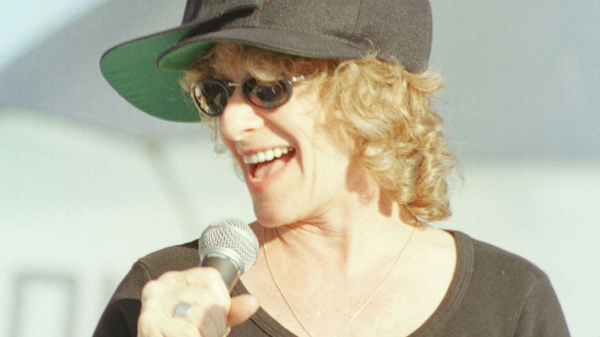 Carole King sings “Locomotion” to the crew of the USS Enterprise during a visit to the ship December 23. King, Mary Chapin Carpenter and David Ball accompanied Defense Secretary William S. Cohen to the Persian Gulf.