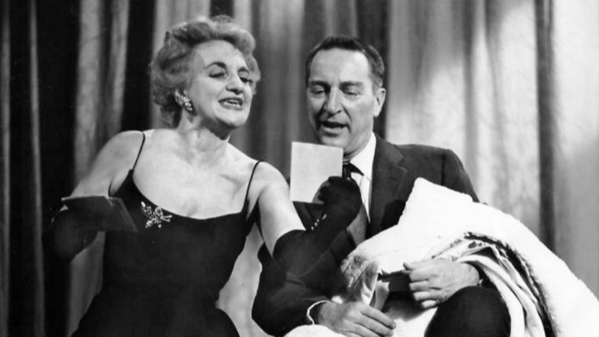Publicity photo of actress Hermione Gingold and host Garry Moore from the television game show I've Got a Secret.