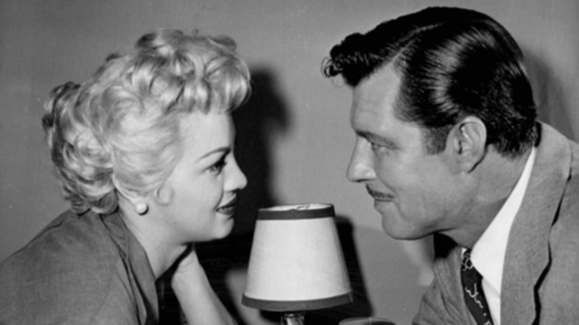 Photo of Angie Dickenson and James Craig from the television program The Millionaire.