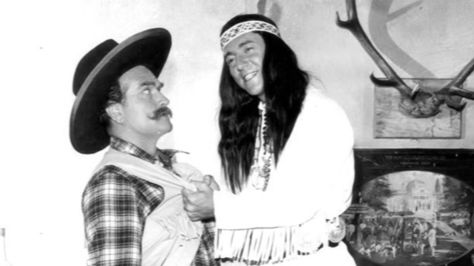 Photo of Red Skelton and singer Bobby Darin in a skit from the television program The Red Skelton Show.  Skelton plays his