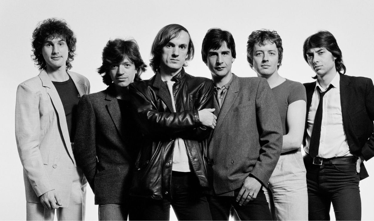 LONDON - 1st JULY: British rock group Sniff 'n' the Tears (singer Paul Roberts (3rd from left), guitarist Loz Netto, bassist Chris Birkin, guitarist Mick Dyche, drummer Luigi Salvoni, and keyboard player Alan Fealdman) posed in London in July 1979.