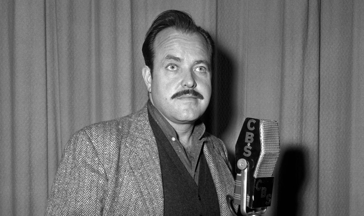 LOS ANGELES - JANUARY 7: Gunsmoke. The CBS Radio version of the western series. At microphone stand, William Conrad (as Marshal Matt Dillon). January 7, 1956.