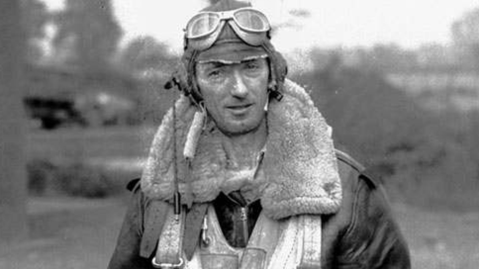 4th Combat Camera Unit member Ron O'Neal makes ready to board his aircraft