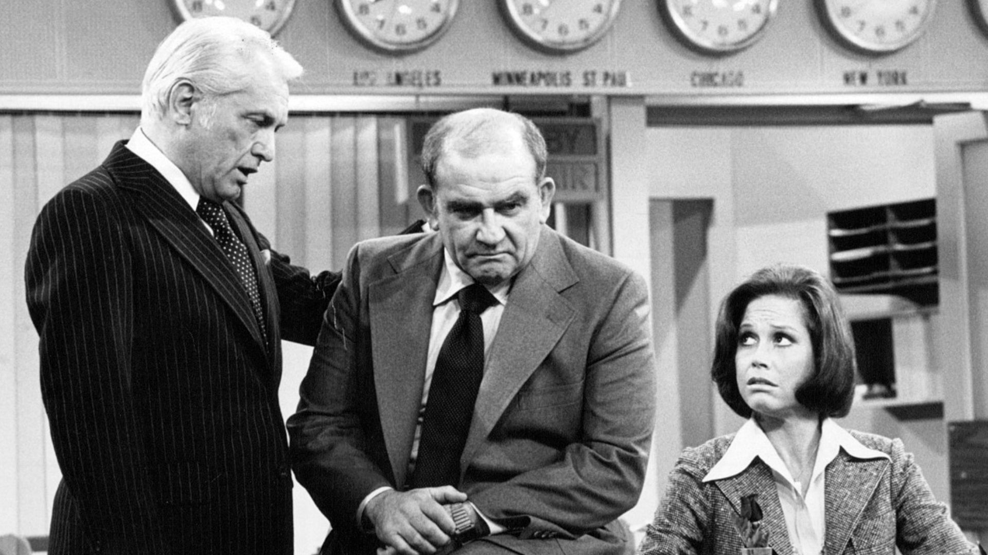 Photo of Ted Knight as Ted Baxter, Ed Asner as Lou Grant and Mary Tyler Moore as Mary Richards from the last episode of The Mary Tyler Moore Show-