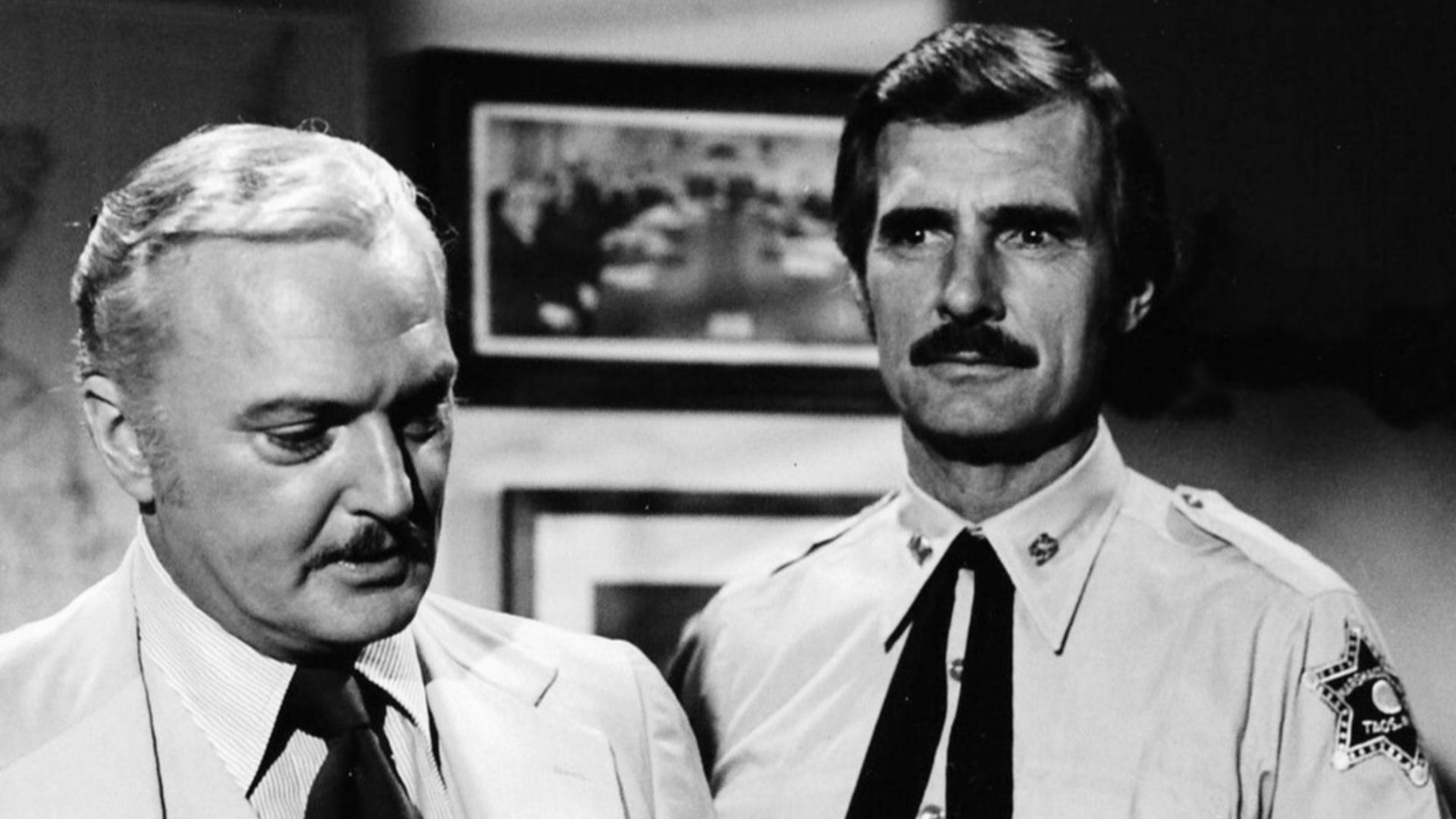 Photo of guest star Jack Cassidy and Dennis Weaver as Sam McCloud from the television series McCloud.
