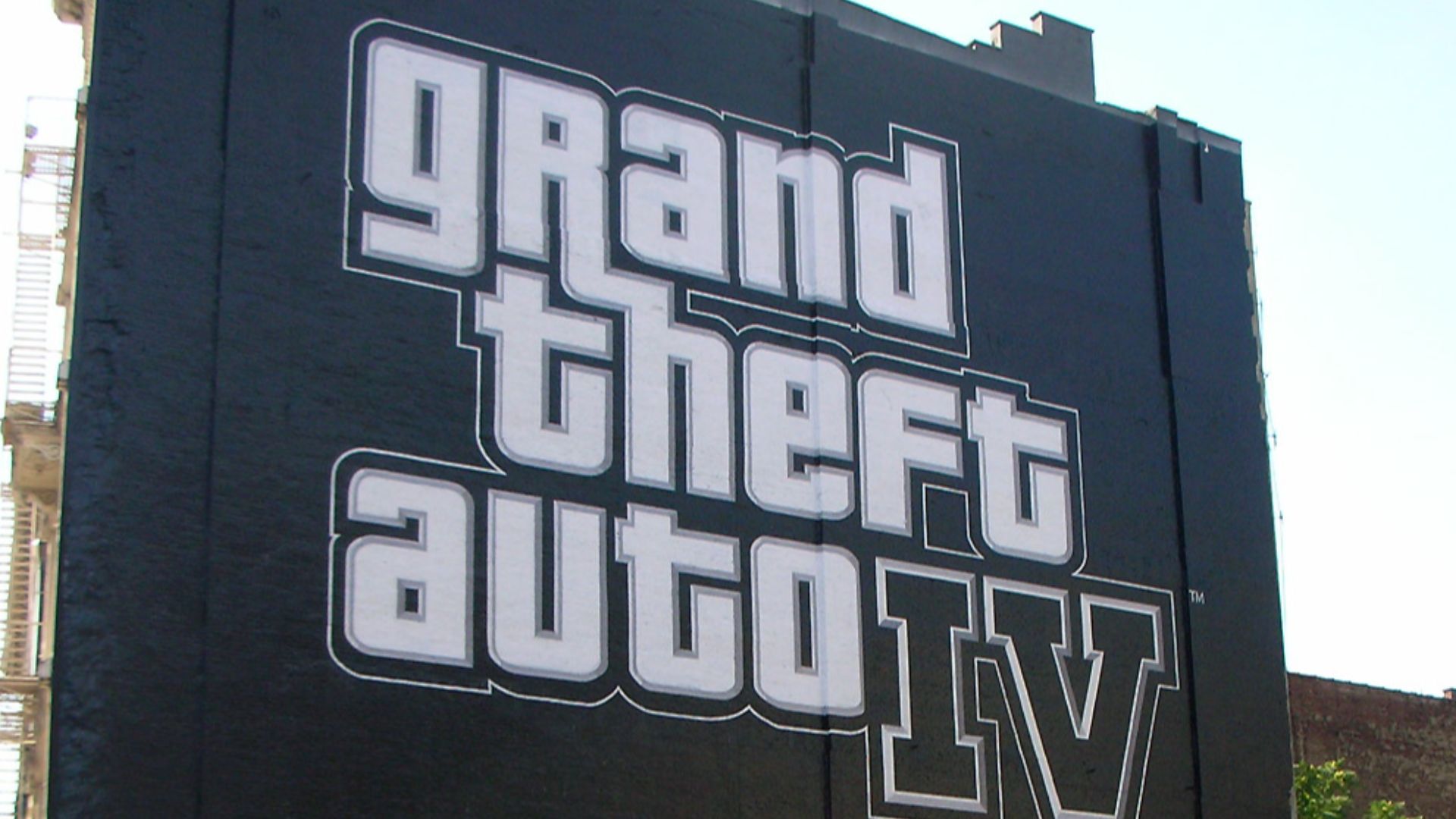 A Grand Theft Auto IV advertisement painted on a wall in the Chinatown District of New York City.