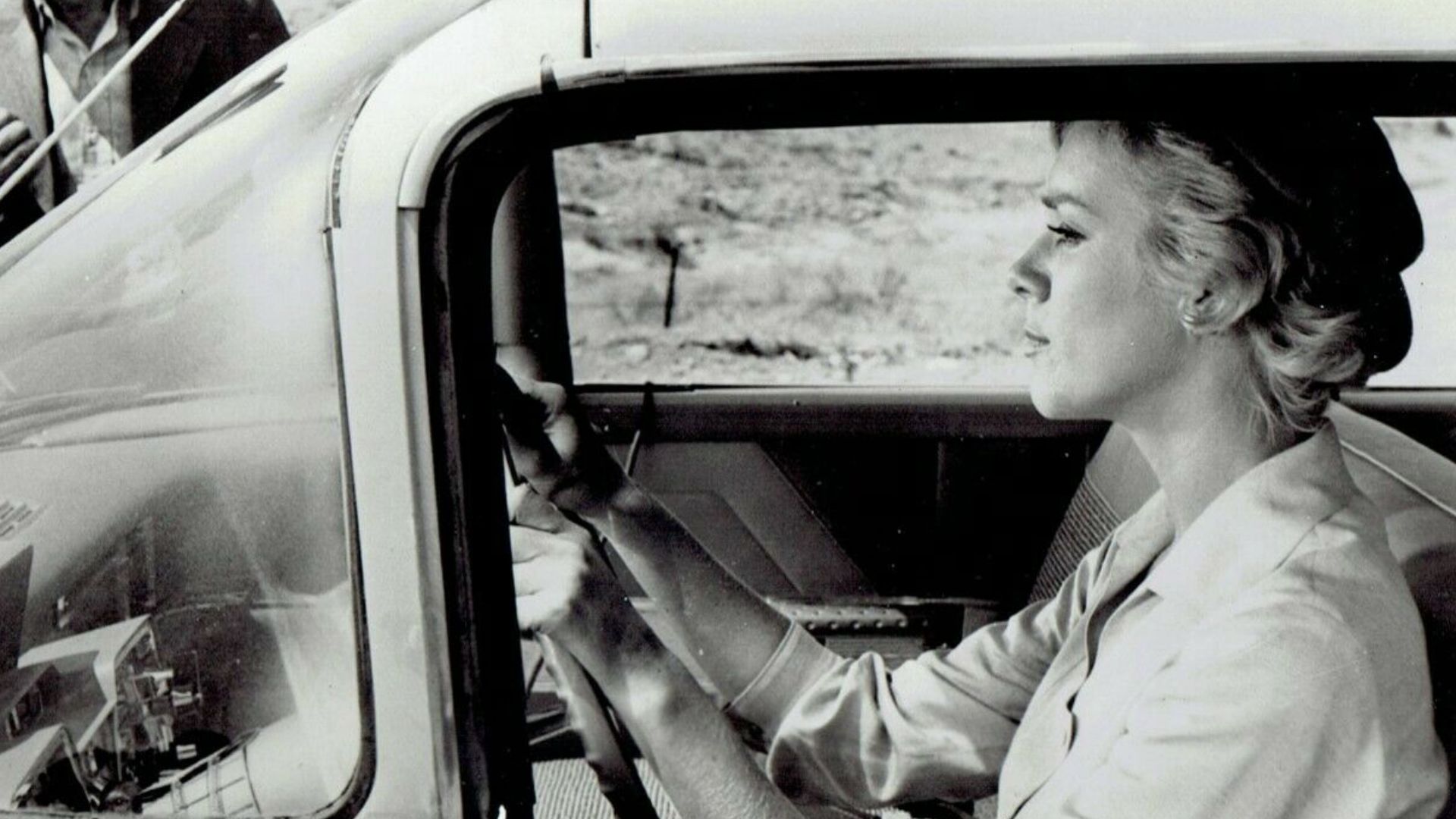 Inger Stevens and Leonard Strong in a scene from The Twilight Zone episode The Hitch Hiker.