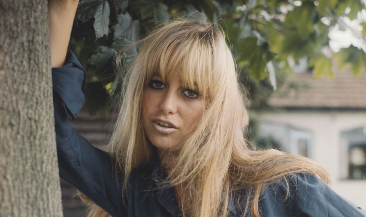 English actress Susan George posed wearing a blue blouse in England in 1972.