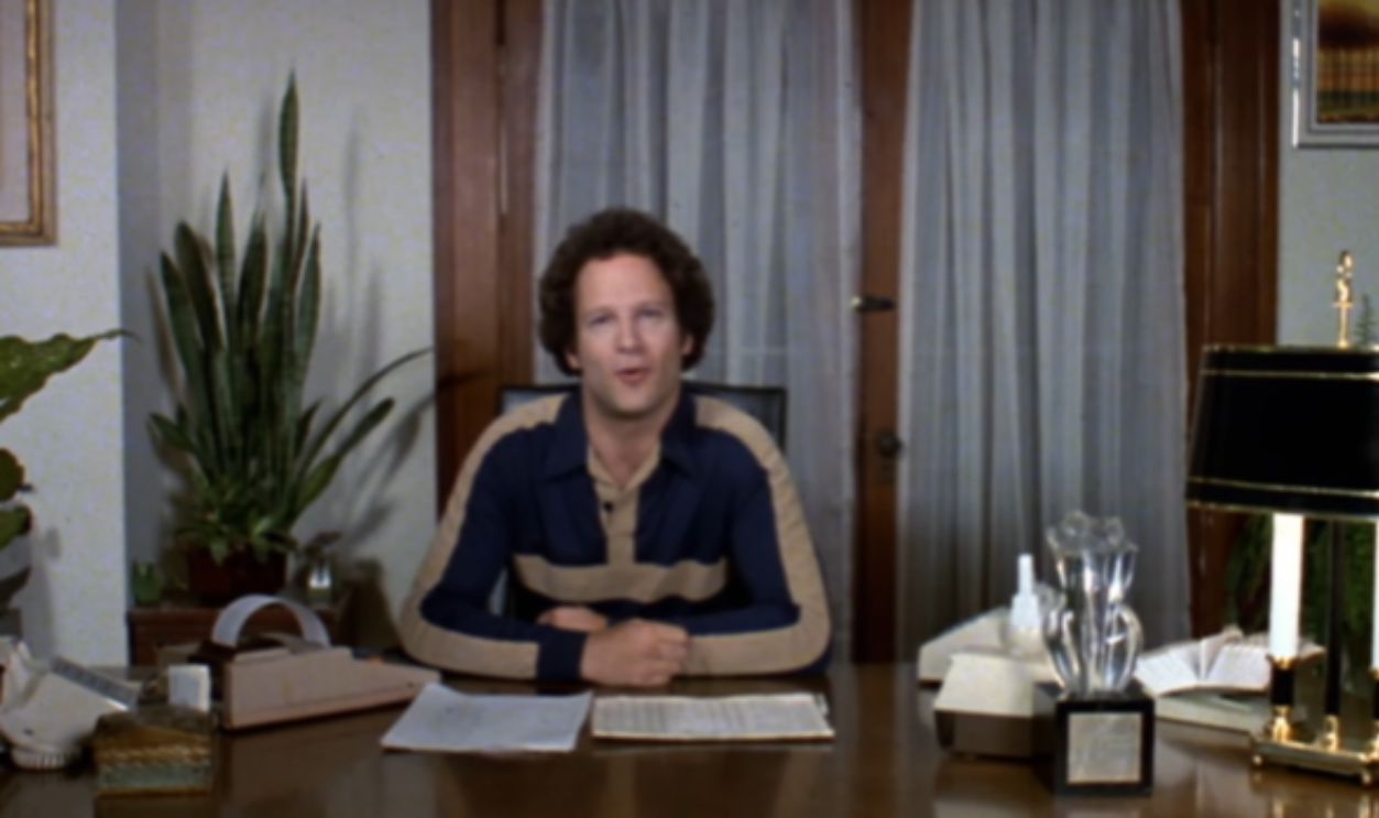 Screenshot from Real Life (1979)