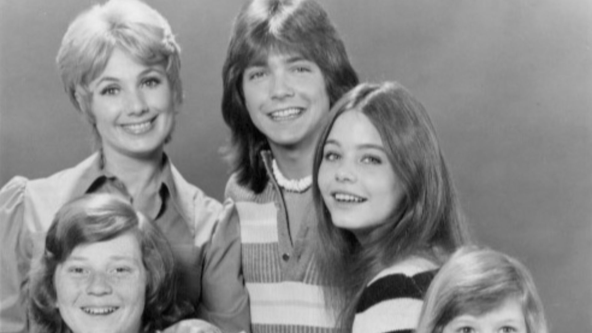 Publicity photo of television actors, (Clockwise from top) David Cassidy, Susan Dey, Suzanne Crough, Brian Forster, Danny Bonaduce and Shirley Jones promoting the ABC comedy series The Partridge Family, circa 1972.