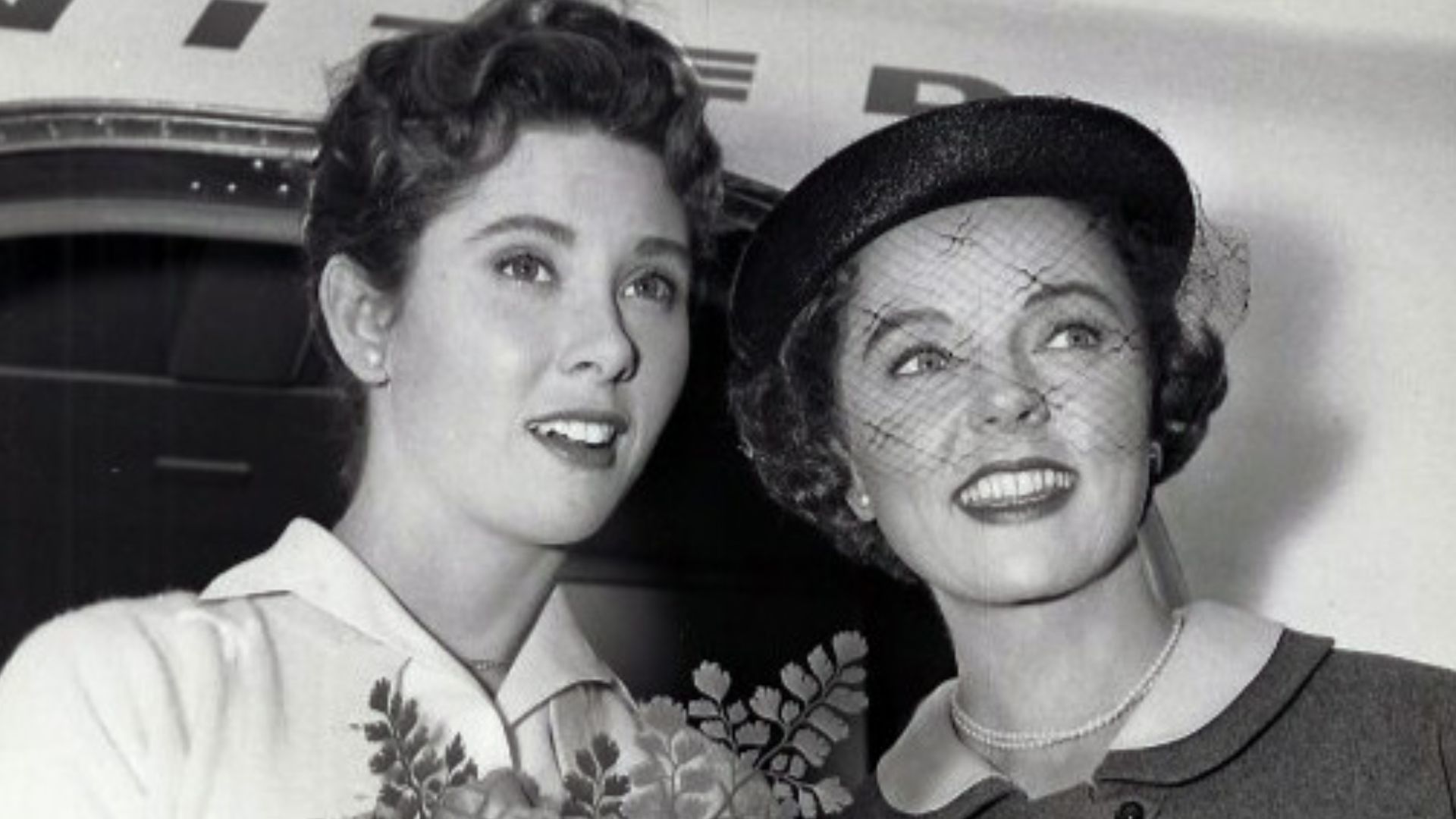 Photo of Elinor Donahue (Betty Anderson) and Jane Wyatt (Margaret Anderson) from the television program Father Knows Best.  Betty and Margaret arrive in Los Angeles; Betty has been chosen as the double of actress Donna Stuart.  Donahue plays a dual role a
