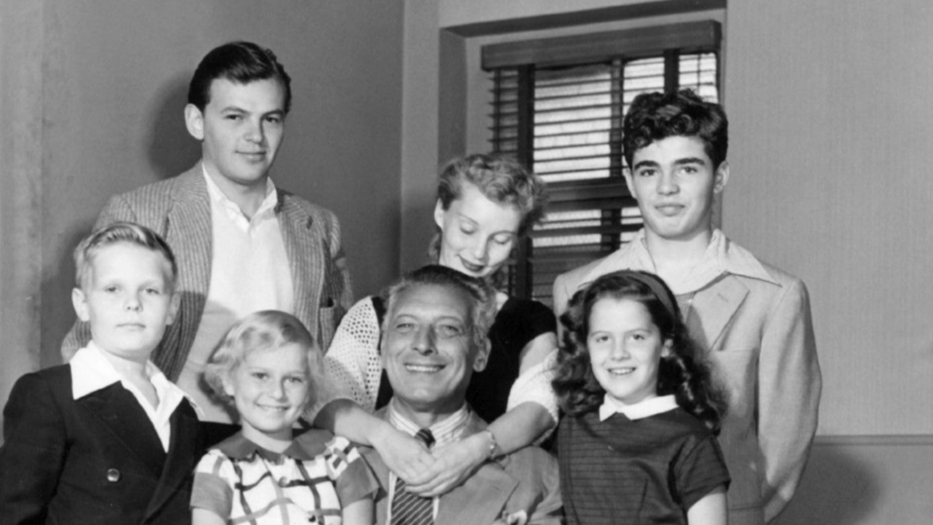 Cast photo of the very short-lived television comedy Bonino.  Ezio Pinza (center) was the star of the show, which dealt with an opera singer trying to raise his six children after the death of his wife.  The series lasted about 3 months on the air in 1953