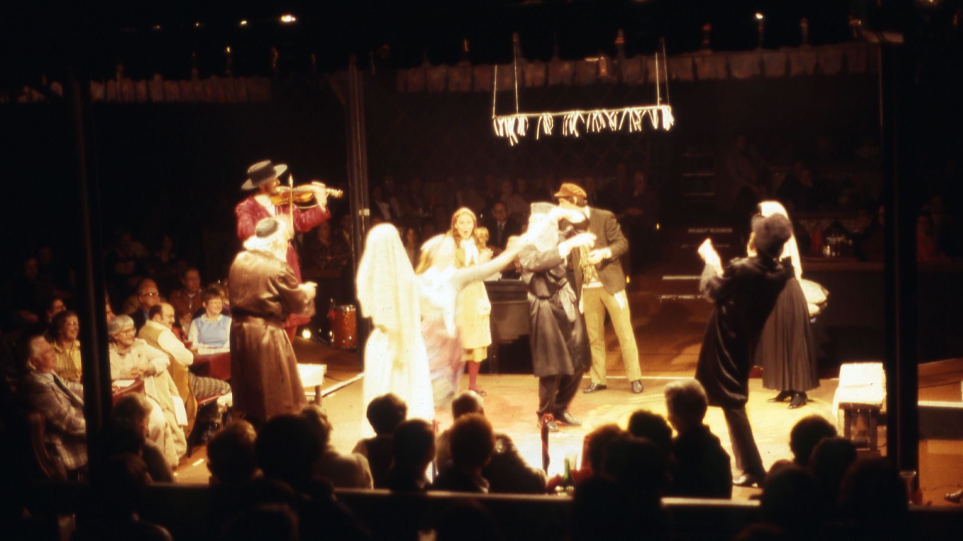 A presentation of the musical Fiddler on the Roof at an unidentified theater.