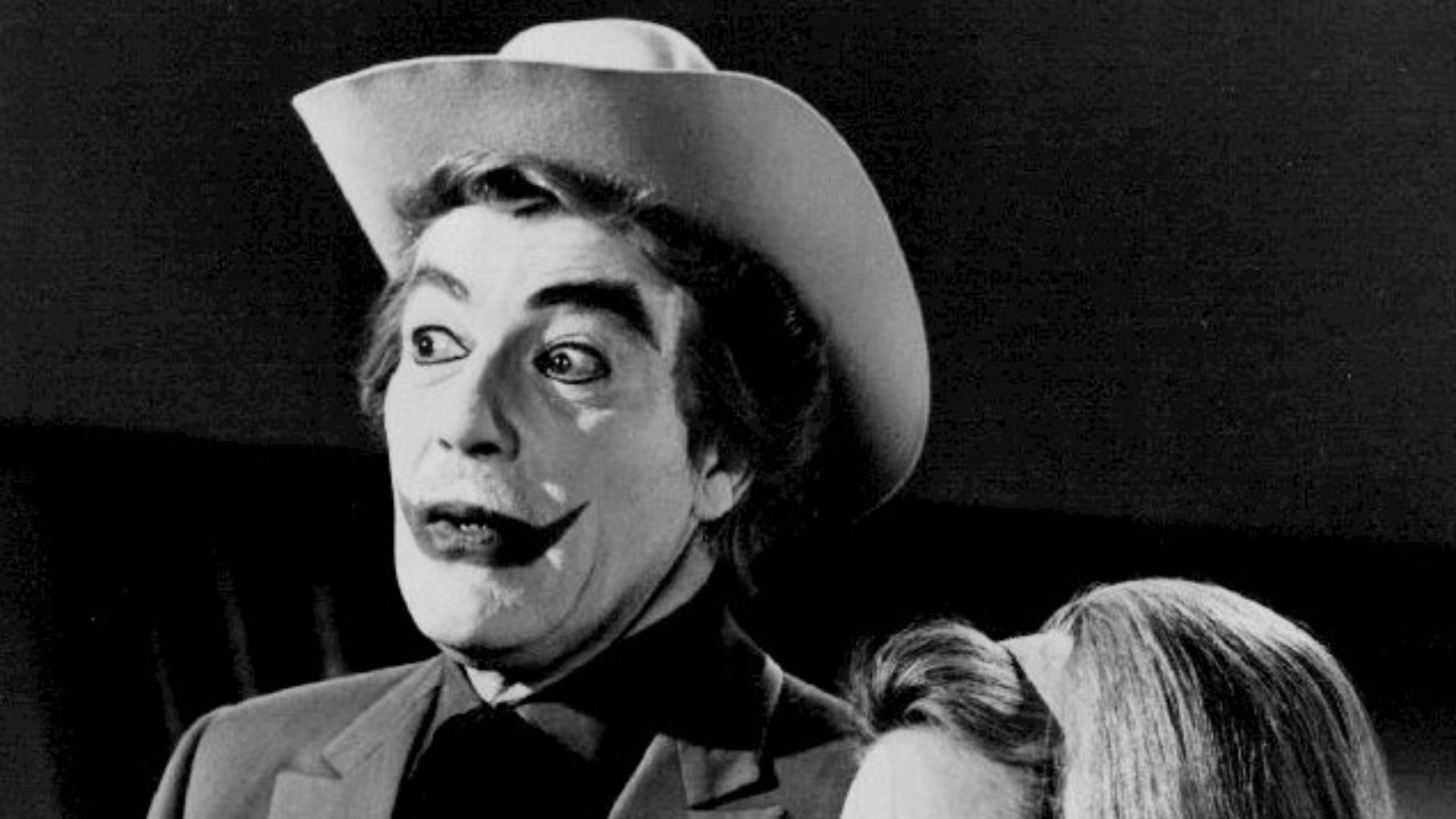 Photo of Cesar Romero as The Joker and Terry Moore as his associate, Venus, from the television program Batman.