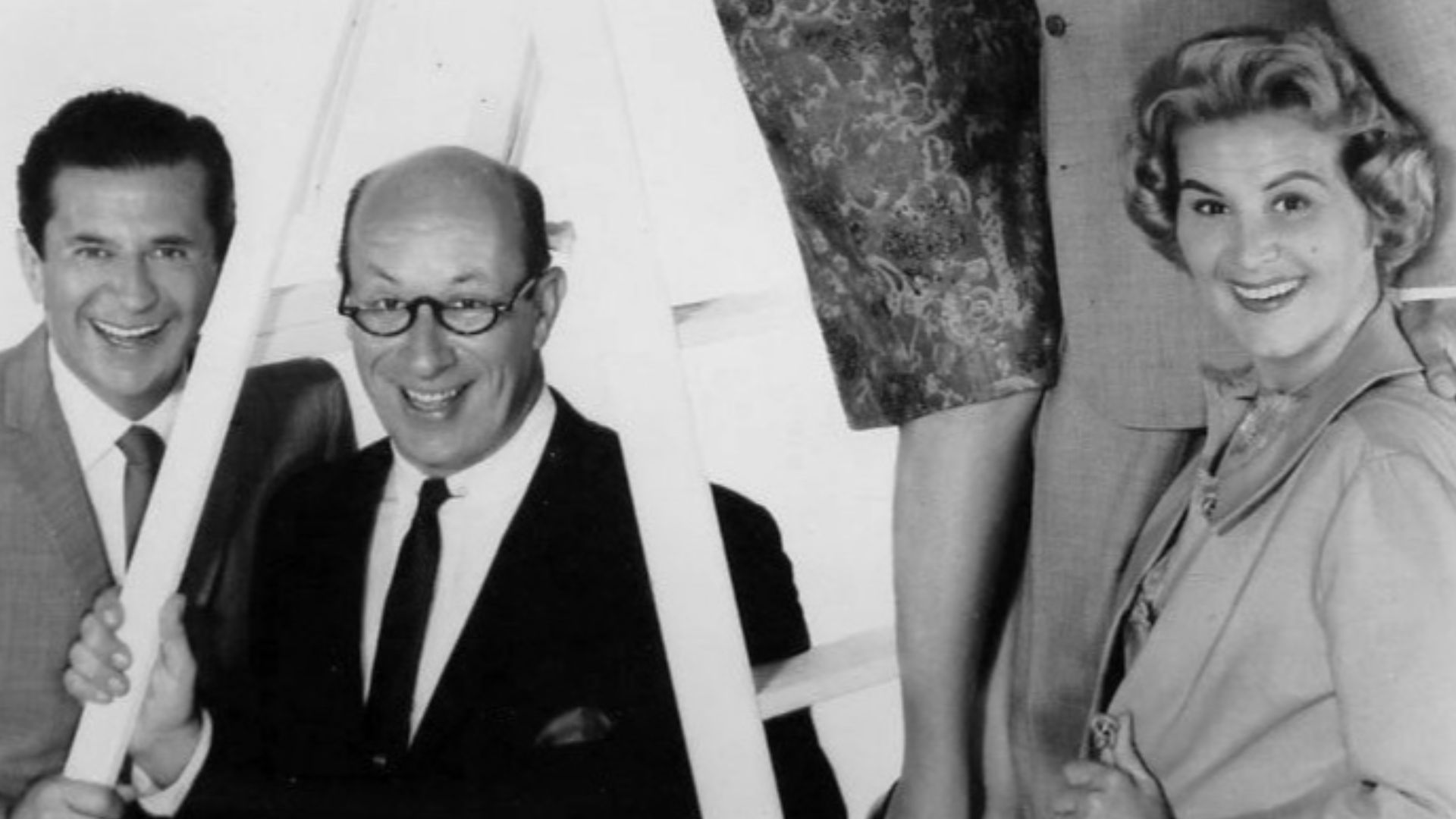 Photo of the main cast of The Dick Van Dyke Show  Above: Mary Tyler Moore (Laura) and Dick Van Dyke (Rob).  Lower: Morey Amsterdam (Buddy), Richard Deacon (Mel) and Rose Marie (Sally).
