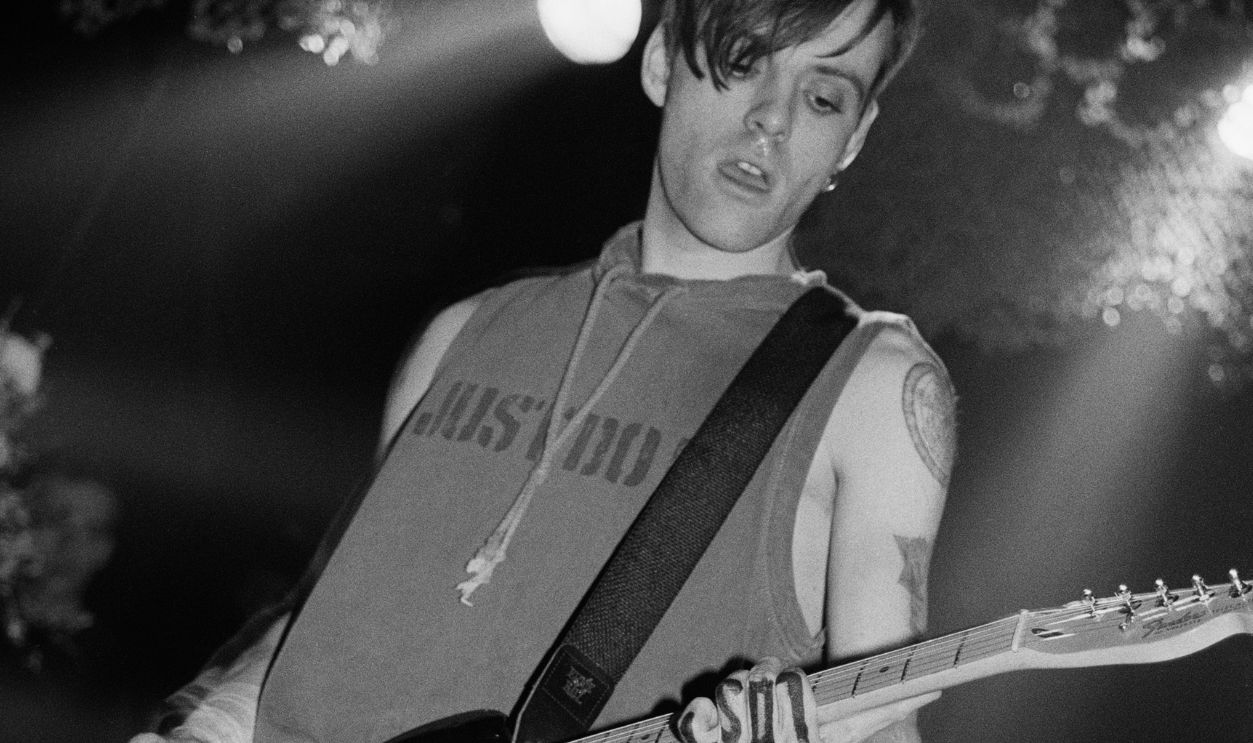 Guitarist Richey Edwards (1967 - 1995) performing with Welsh rock group Manic Street Preachers, 1994.