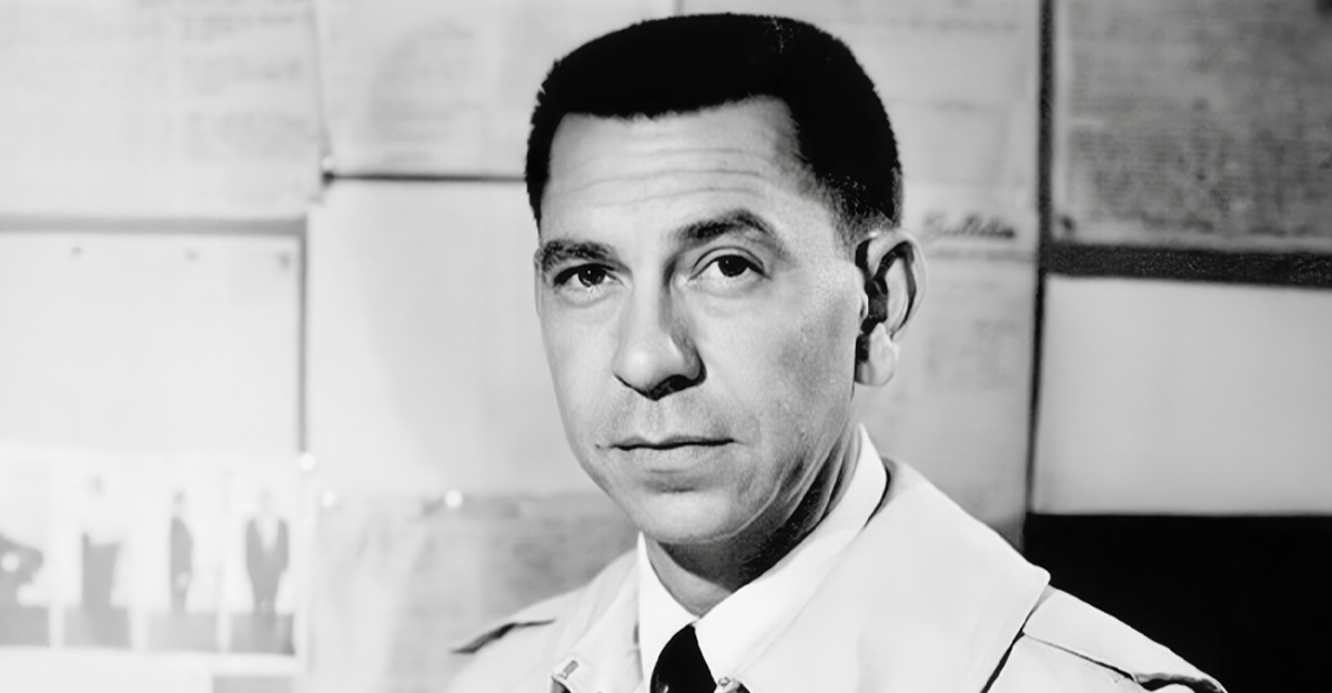 Jack Webb as Sergeant Joe Friday from the television series Dragnet.