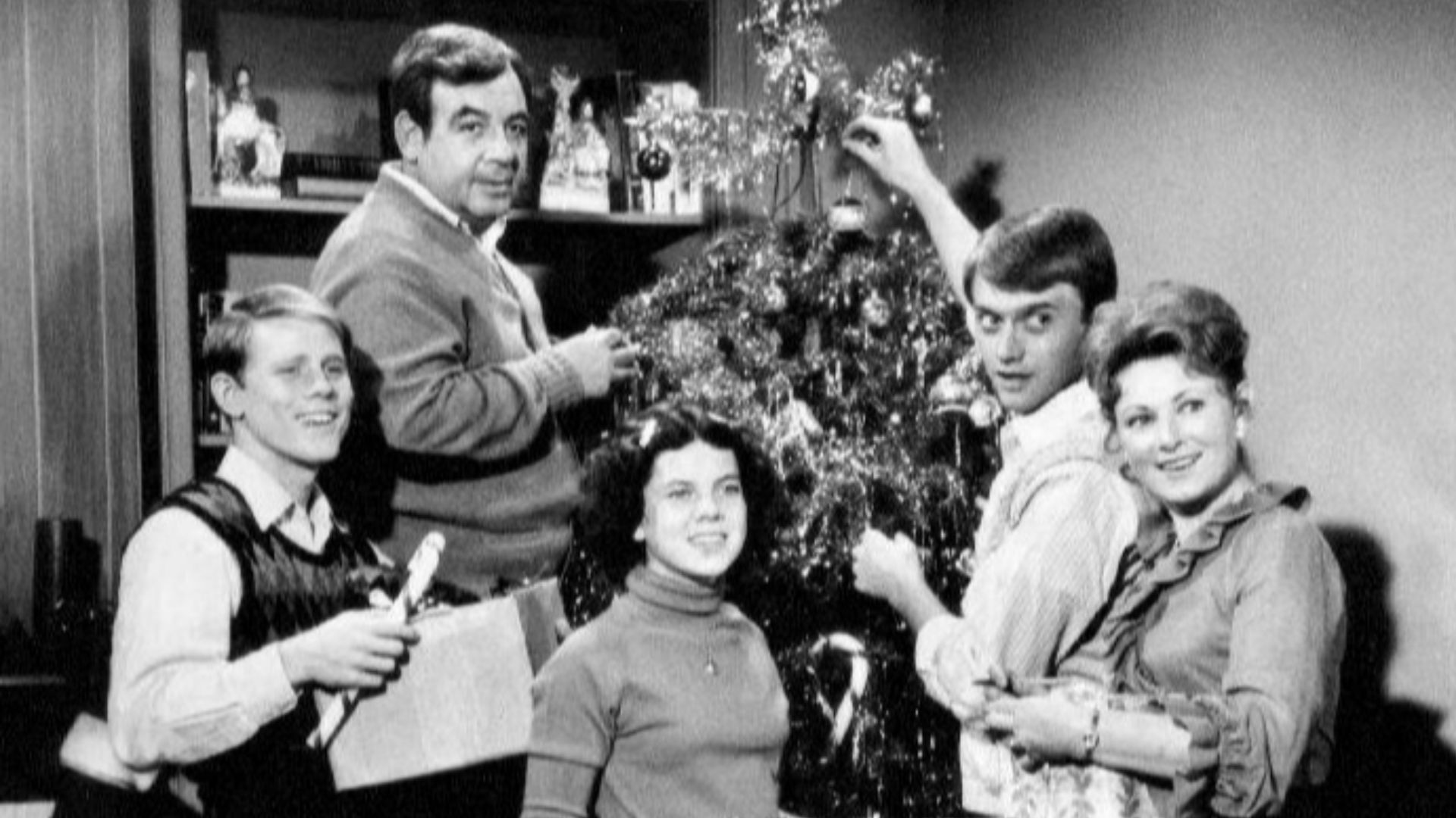 Publicity photo of the Cunningham family from the television program Happy Days.  The young man standing with Marion Ross is Randolph Roberts, who played the role of the Cunningham's older son, Chuck.  He was not a regular on the series.
