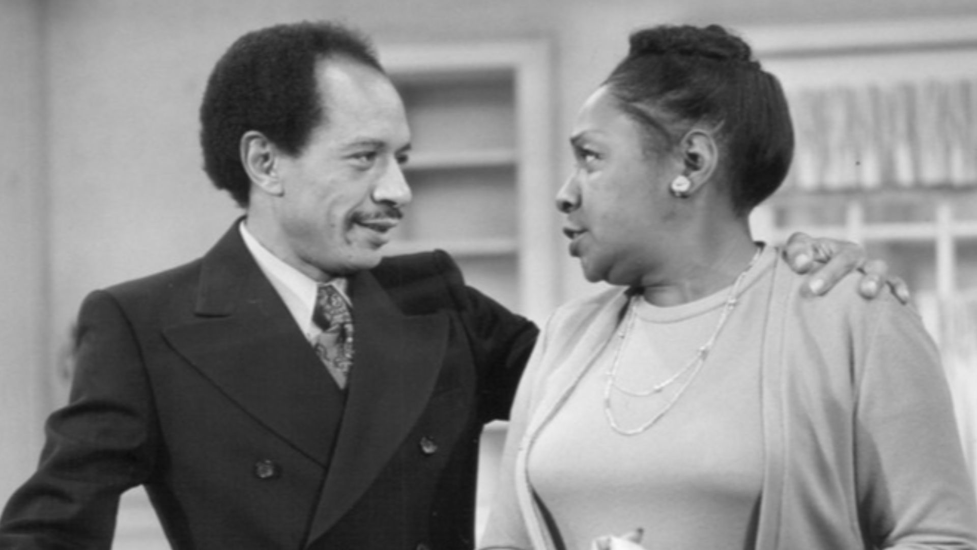 Publicity photo from  All in the Family. Pictured are Sherman Helmsley (George Jefferson) and Isabel Sanford (Louise Jefferson) as they pack to move from Queens to Manhattan. This began the television series The Jeffersons.
