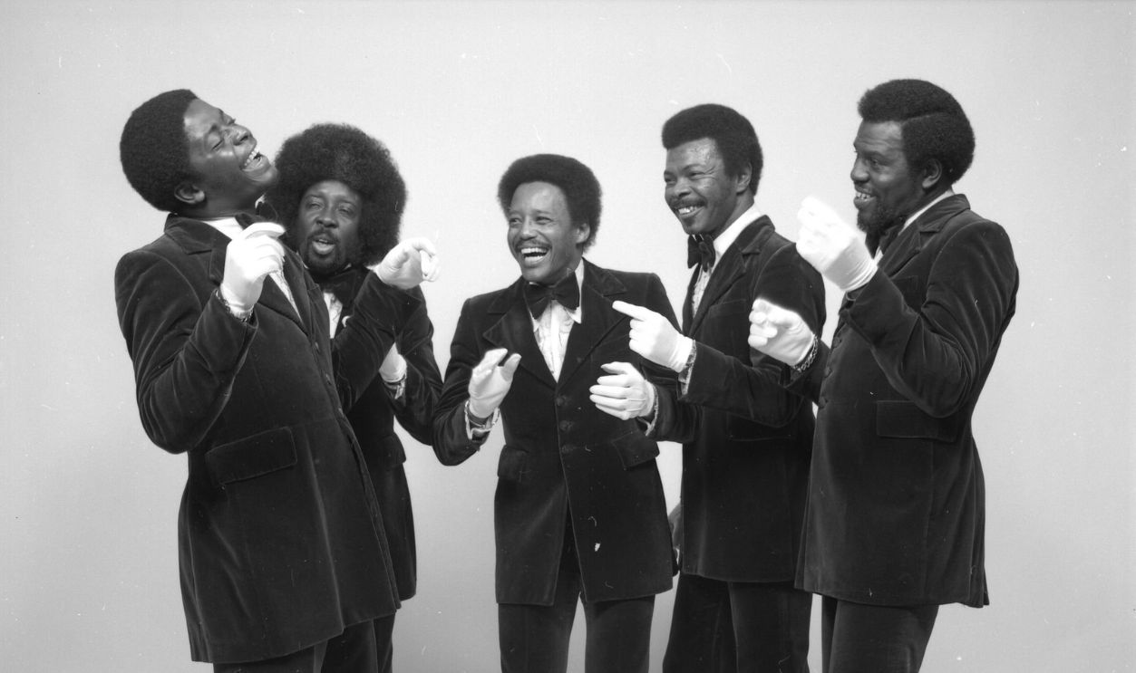 Portrait of American rhythm & blues group the Manhattans, New York, New York, 1973. They wear velour suits, white gloves, and bow ties. 