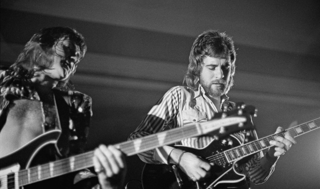 LONDON - 1st NOVEMBER: Bass guitarist Colin Pattenden and guitarist Mick Rogers perform live on stage with Manfred Mann's Earth Band at Westfield College in North London in November 1973.