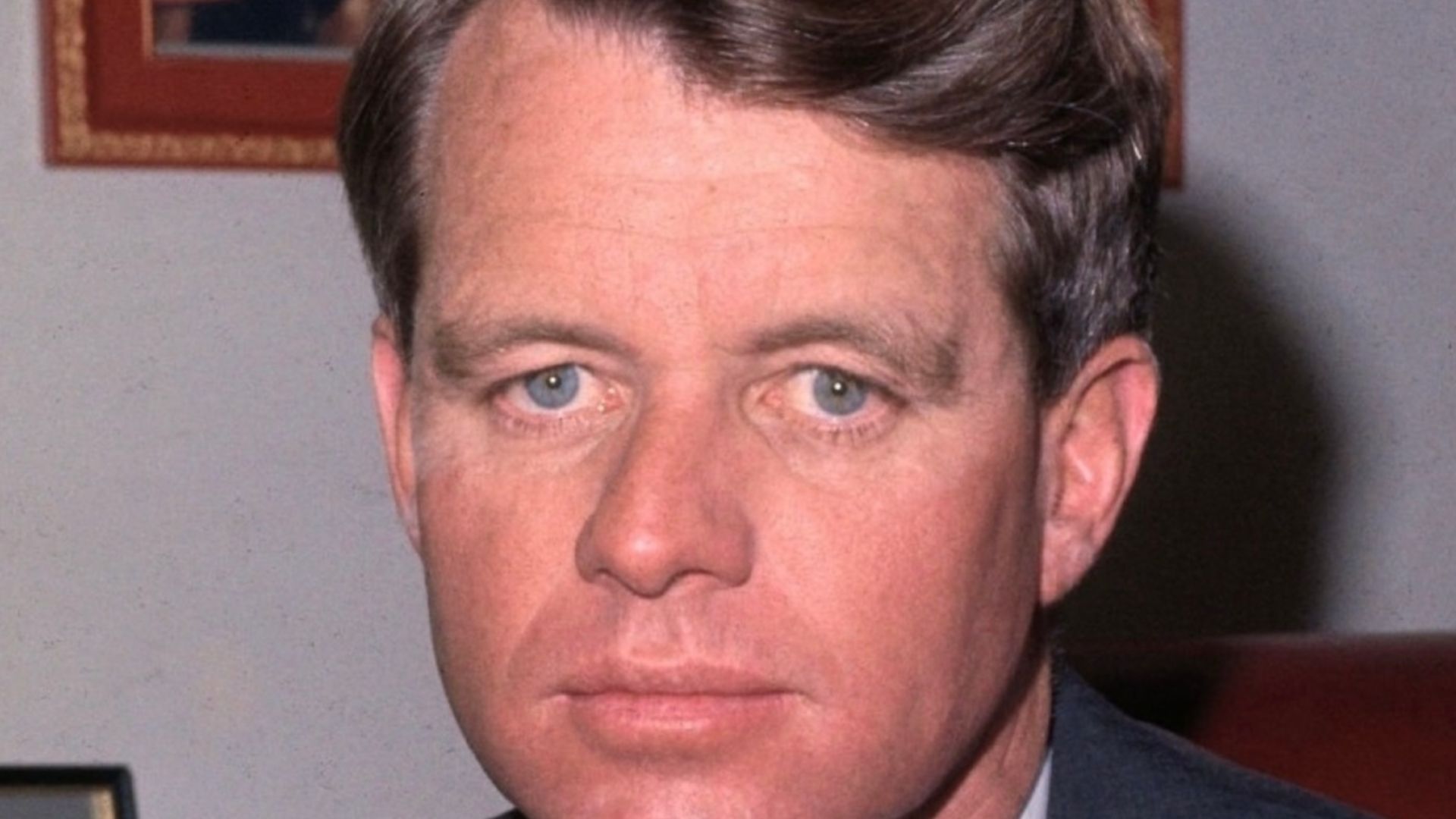 (Original Caption) Photo of New York Senator Robert F. Kennedy seated at his desk in his Washington office.
