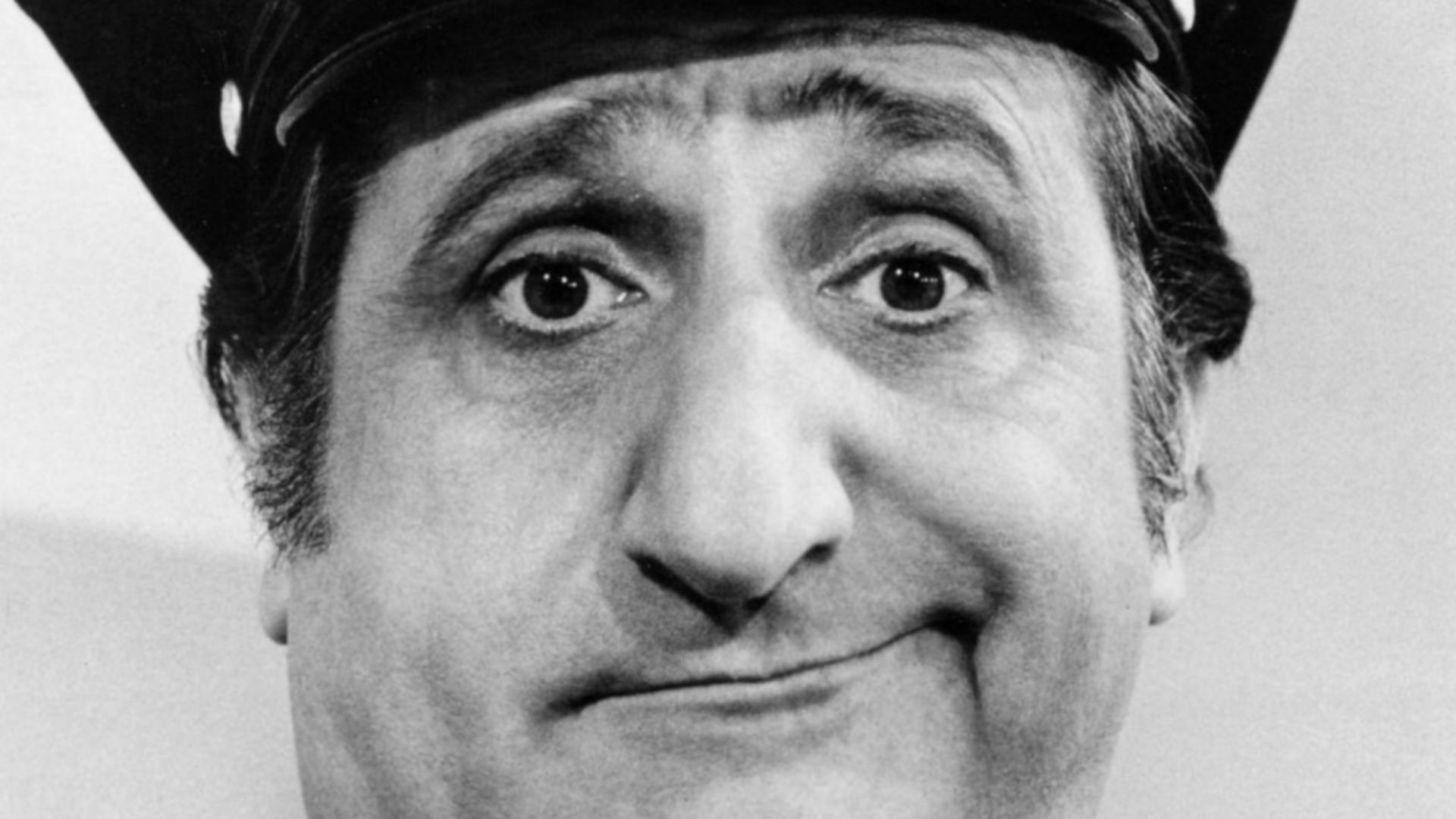 Photo of Al Molinaro as Murray the Cop from the television program The Odd Couple.  Molinaro is also known for his role as Al, the new owner of Arnold's, in Happy Days.