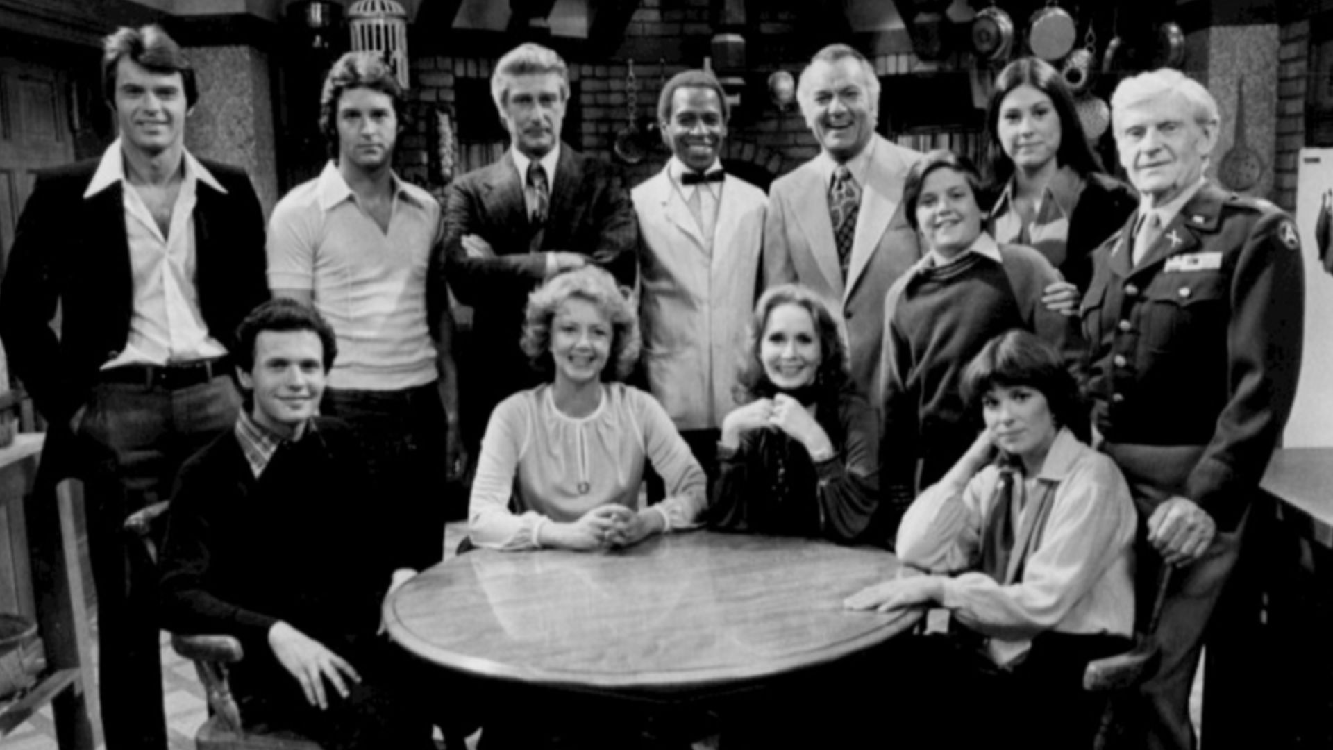 Photo of the entire cast of the television program Soap at its premiere.
Standing, from left:Robert Urich (Peter Campbell), Ted Wass (Danny Dallas), Richard Mulligan (Bert Campbell), Robert Guillaume (Benson), Robert Mandan (Chester Tate), Jimmy Baio (Bil