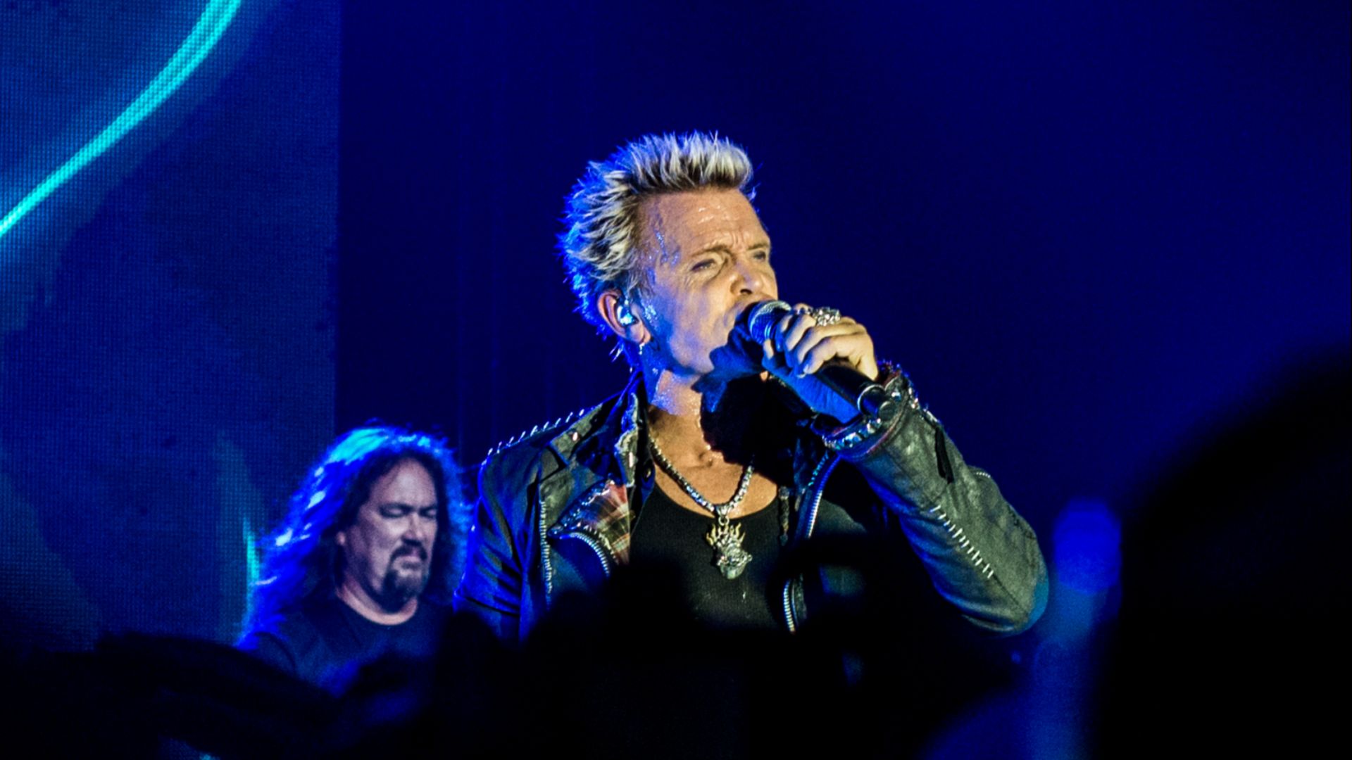Billy Idol performing at the 2013 Bonnaroo Music and Arts Festival in Manchester, Tennessee