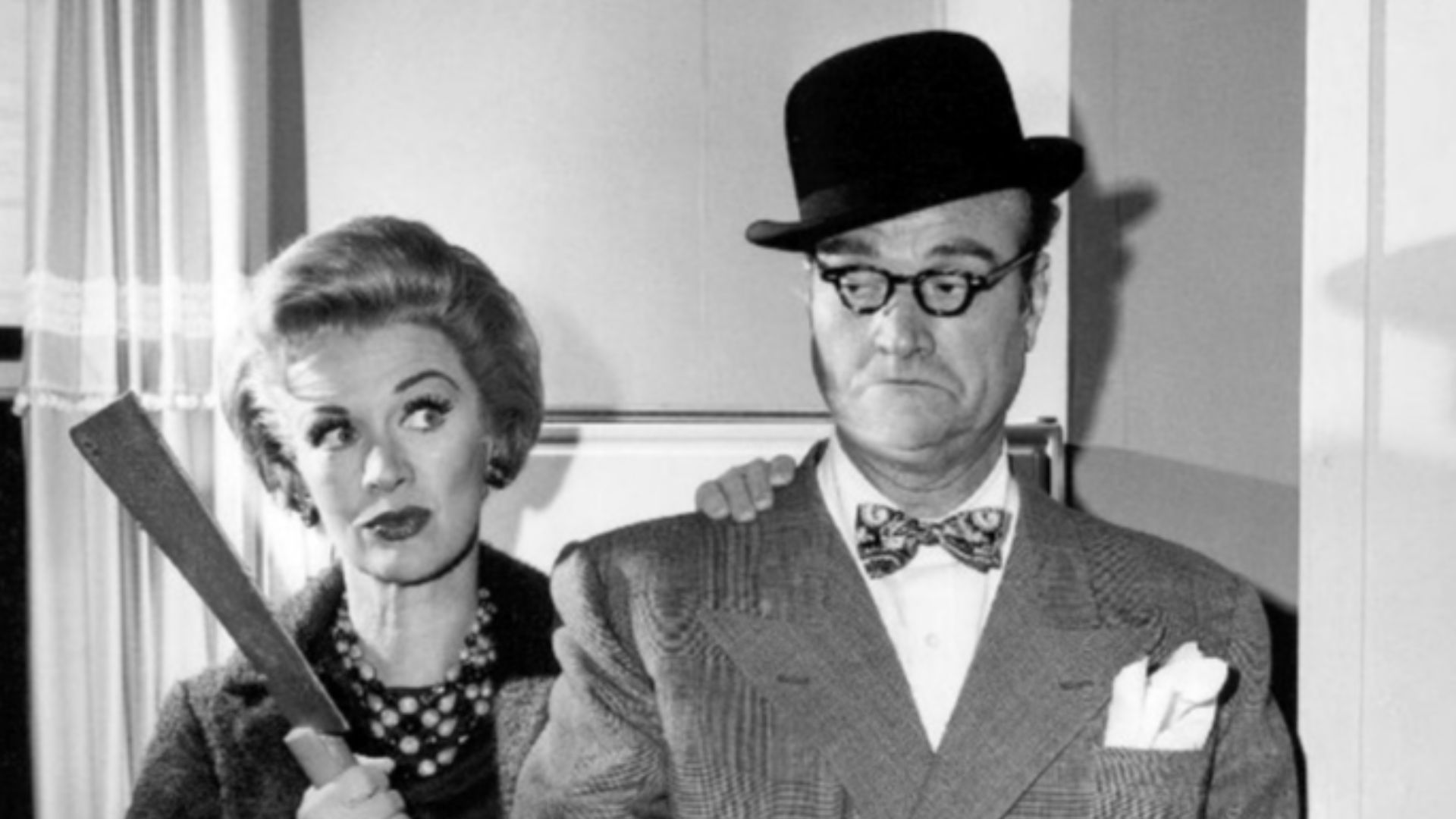Photo of Red Skelton as George Appleby and Eve Arden as his wife, Clara, from The Red Skelton Show.  When Skelton performed the henpecked husband, the part of Clara was played by the female guest star for that particular week.