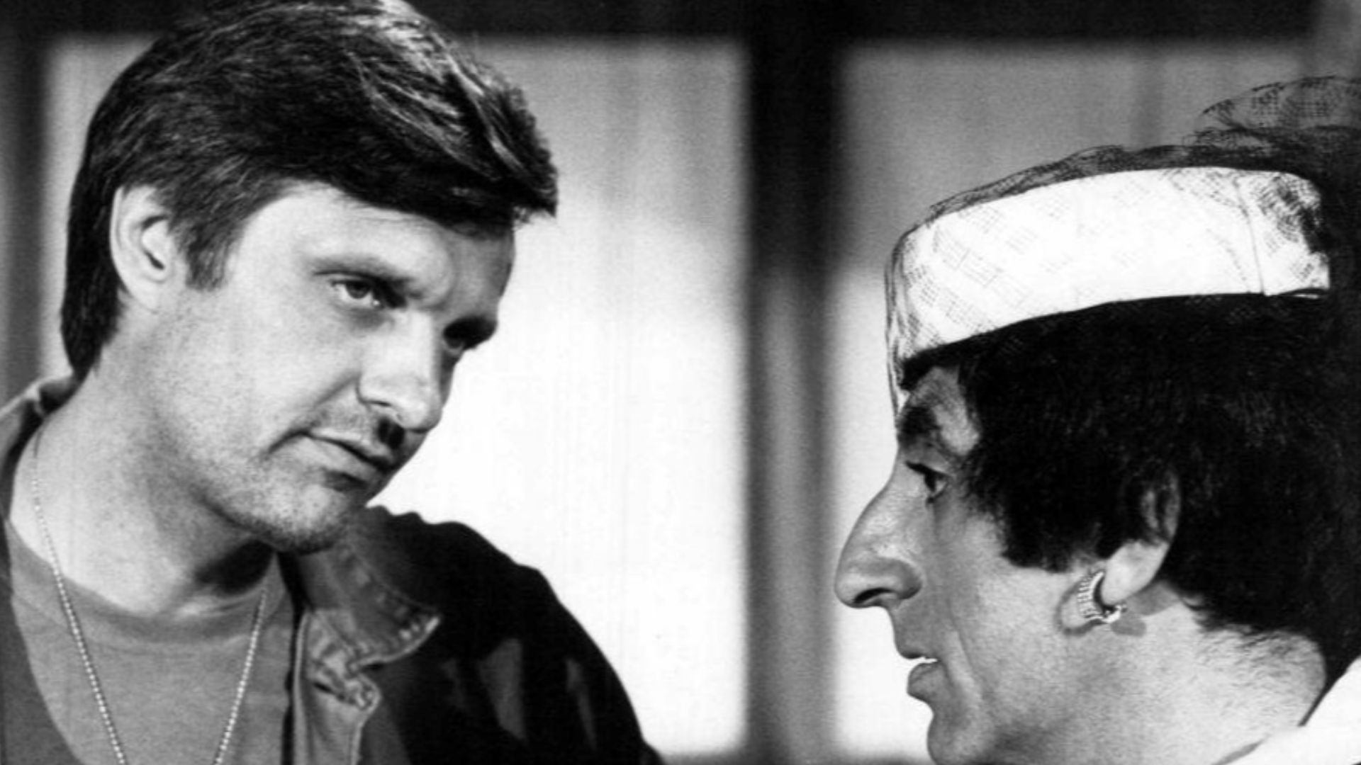 Photo of Alan Alda as Hawkeye and Jamie Farr as Klinger from the television program M.A.S.H..