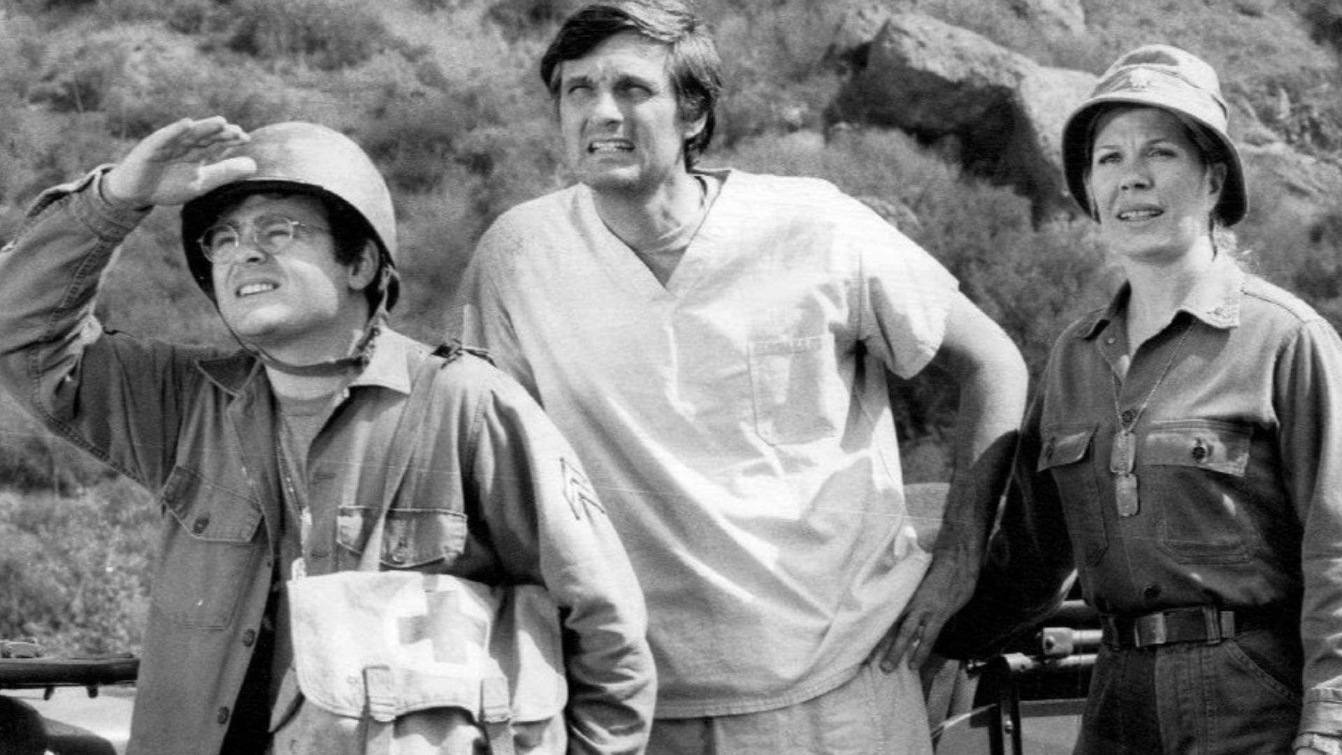 Photo of Gary Burghoff, Alan Alda and Loretta Swit from the television program M*A*S*H.  Radar, Hawkeye and Margaret are on the alert when there's a rumor of an invasion by Chinese troops.