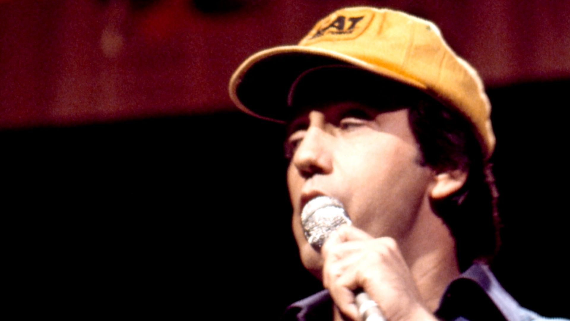 Ray Stevens performing in concert: photo taken during the taping of The Johnny Cash Show in Nashville in the 1970s; Ray Stevens is wearing a