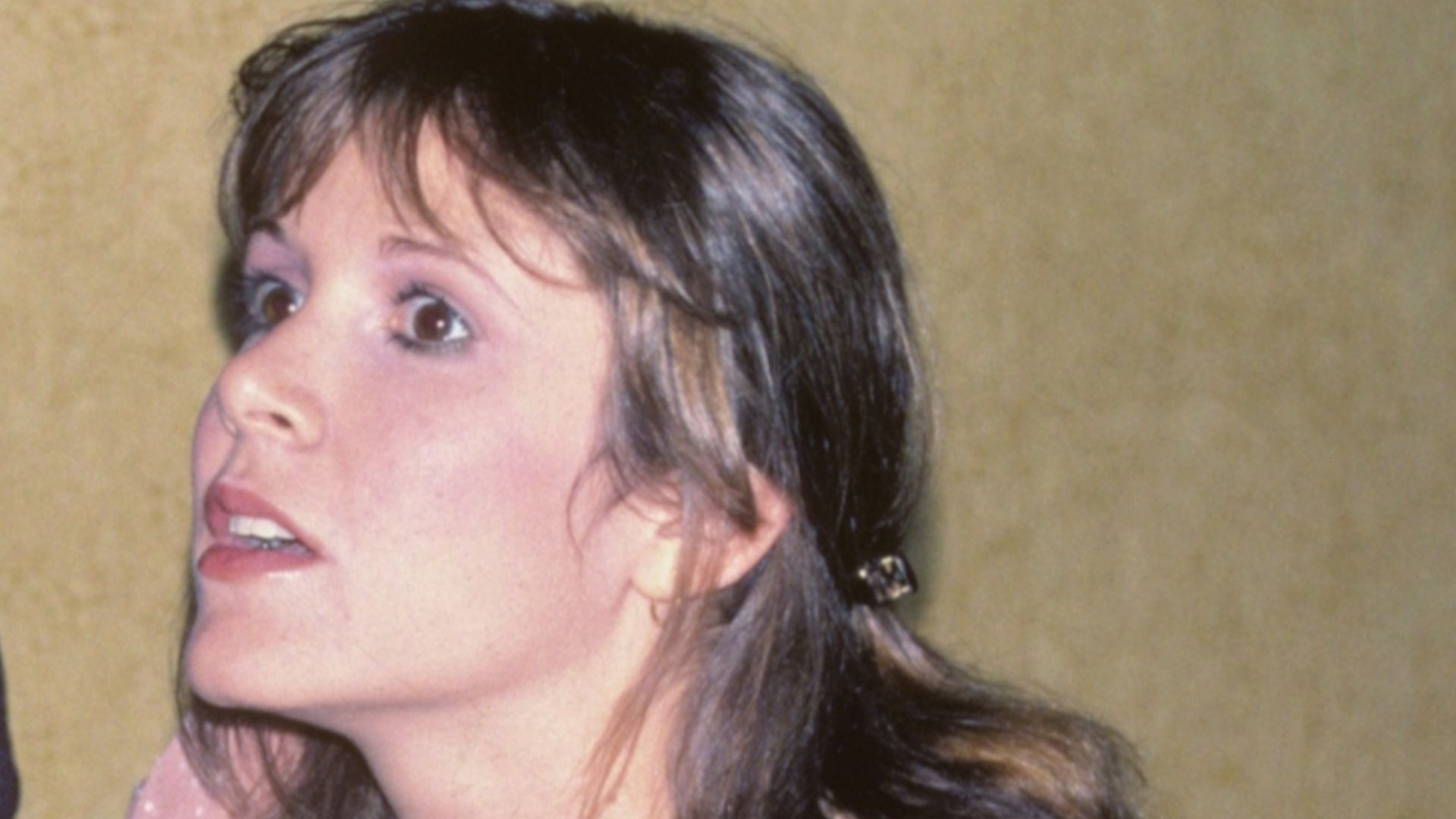 Carrie Fisher at the private party after the premiere of the Sylvester Stallone movie FIST