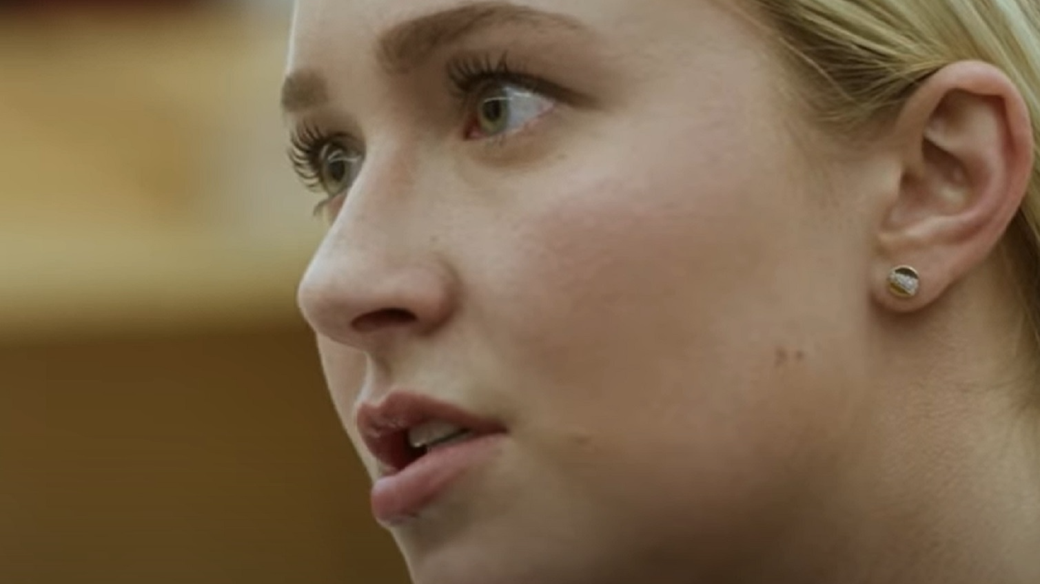 Screenshot: Hayden Panettiere close up face shot looking upset - from Custody 2016