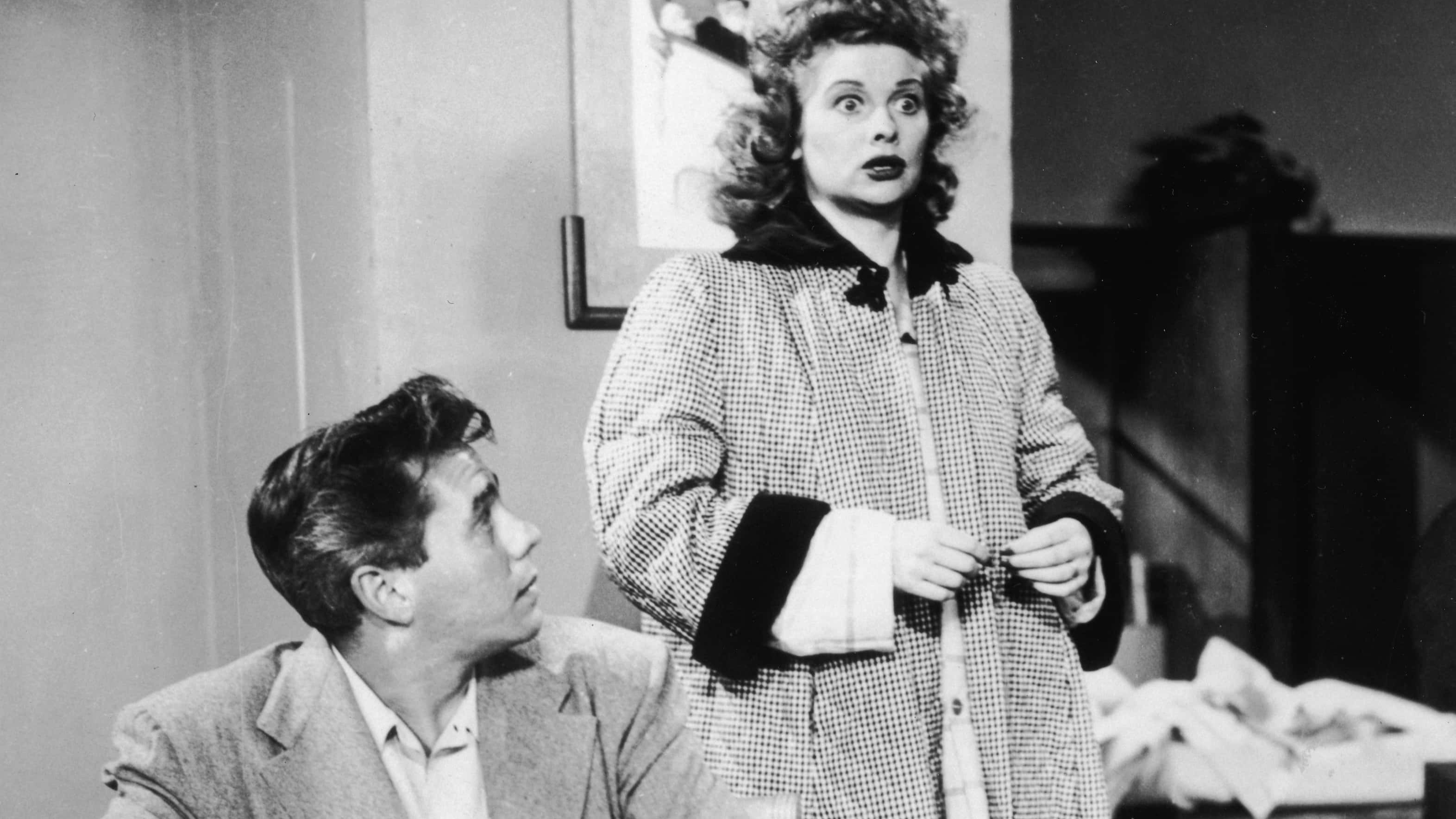 American actor Lucille Ball (1911-1989) and Cuban-born actor Desi Arnaz (1917-1986) talk to each other