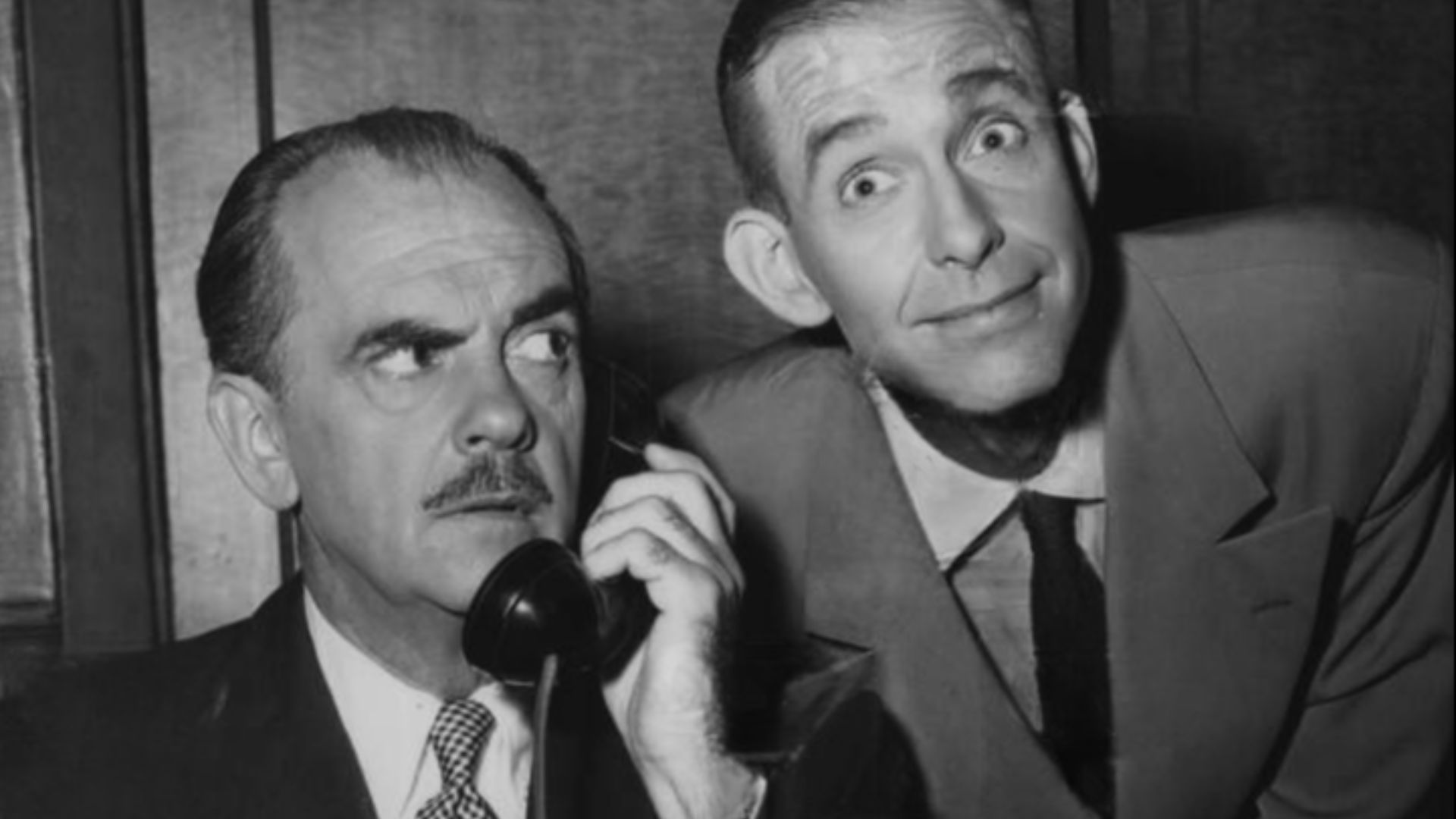 From the look on Larry Keating's face (left), Hank McCune's hopeful expression (right) is due for a radical change. But the situation is normal, for Hank is always getting himself and Larry in hot water in the new NBC-TV situation comedy