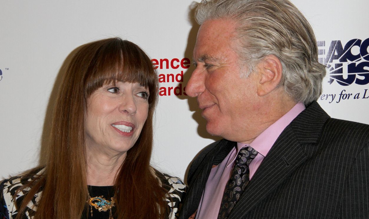 Mackenzie Phillips and Leonard Lee Buschel arrive at the