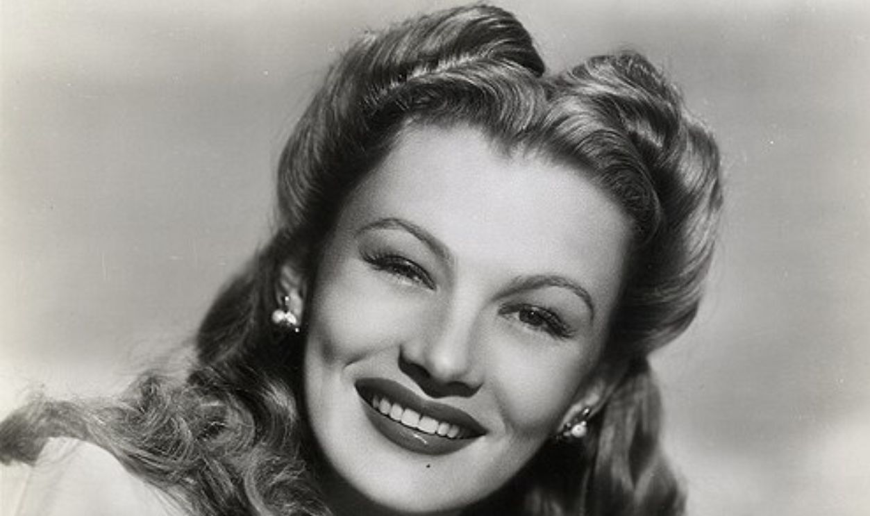 American Actress Veronica Lake
Squib from reverse side of print: ACCENT ON GLAMOUR — The striking beauty of blonde Veronica Lake has been apparent ever since she debuted in movies as a girl with hair over one eye. Gone is the Peek-a-boo Bang, but the glam