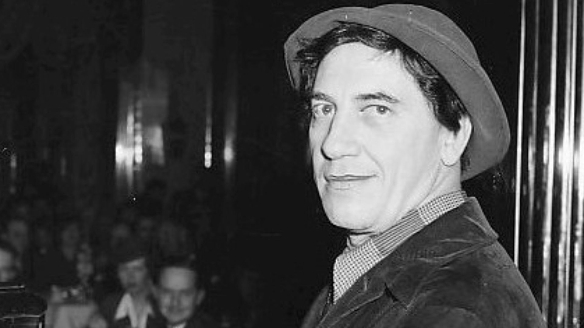 Photo of Chico Marx at the piano.